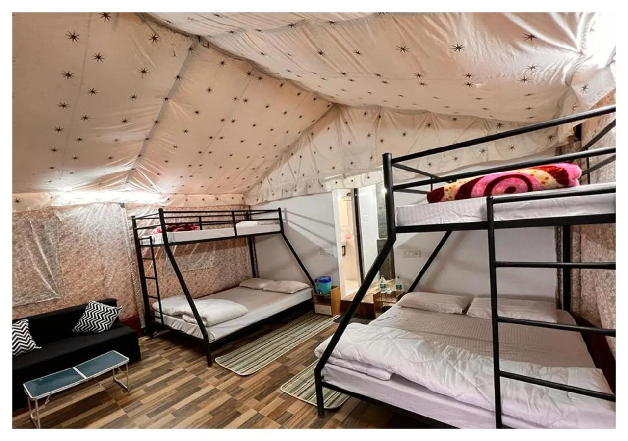 Bed in The Cocoon Camps & nature Resorts