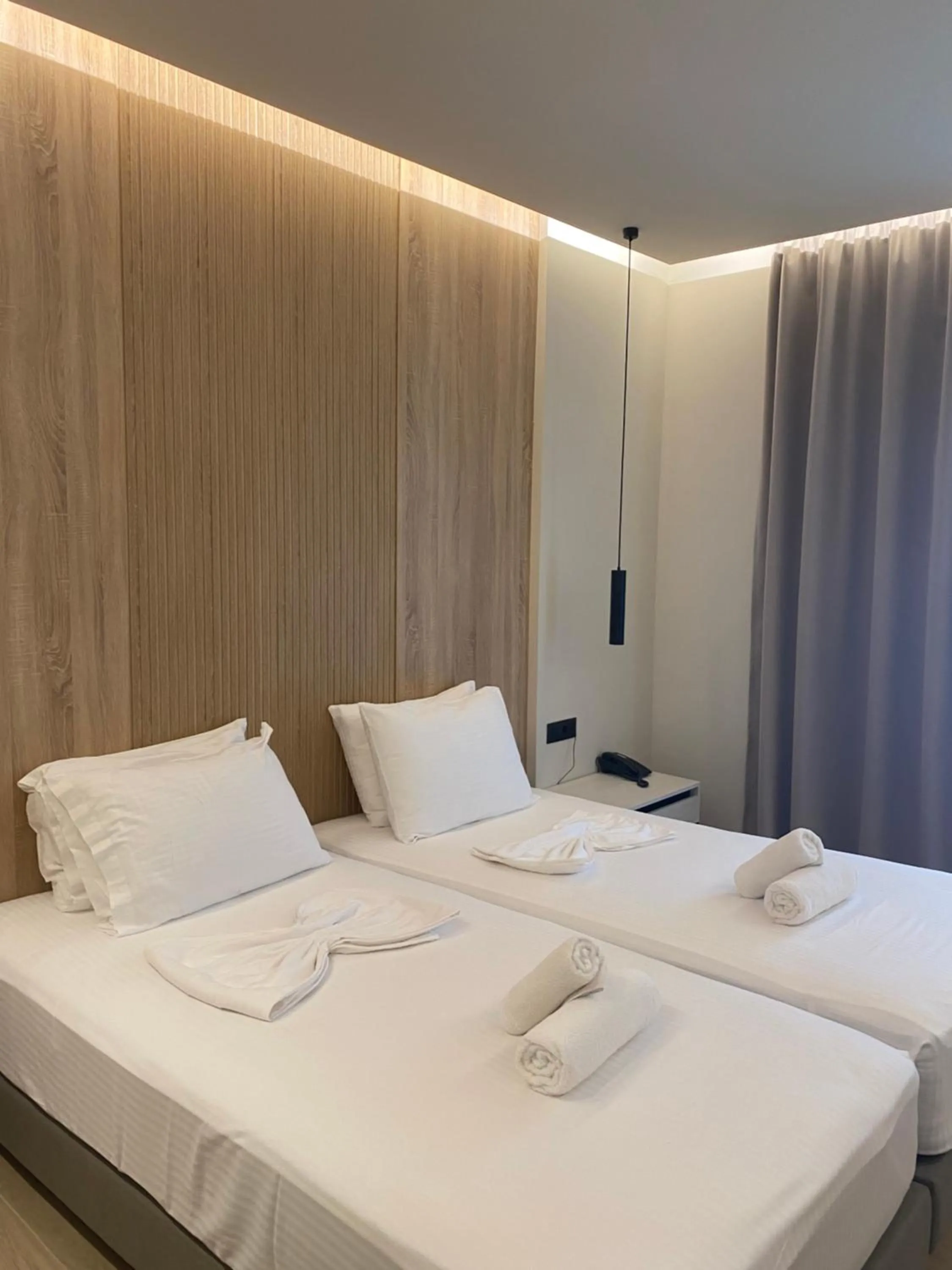 Bed in Barbie Hotel Apartments