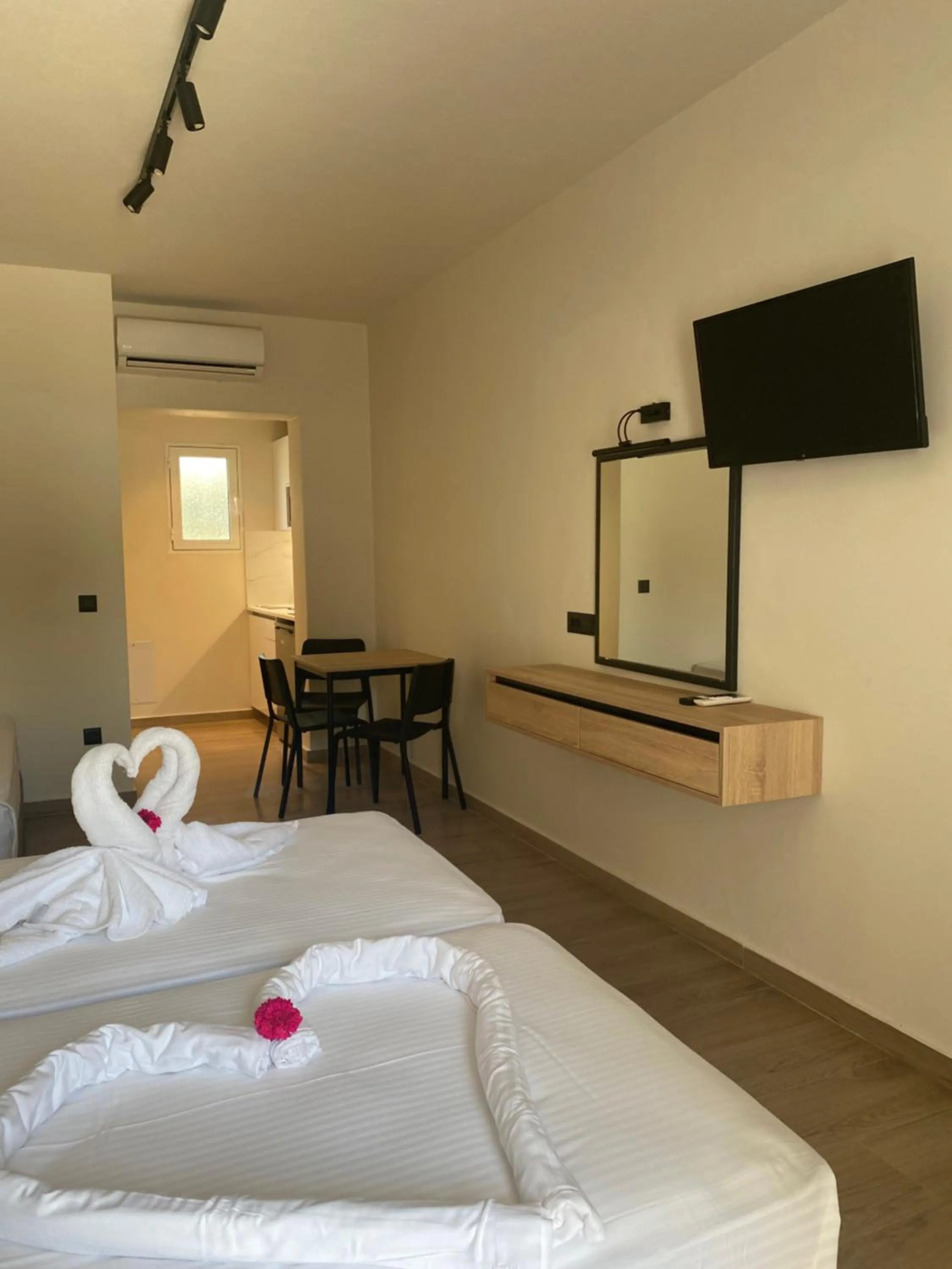 Bed in Barbie Hotel Apartments