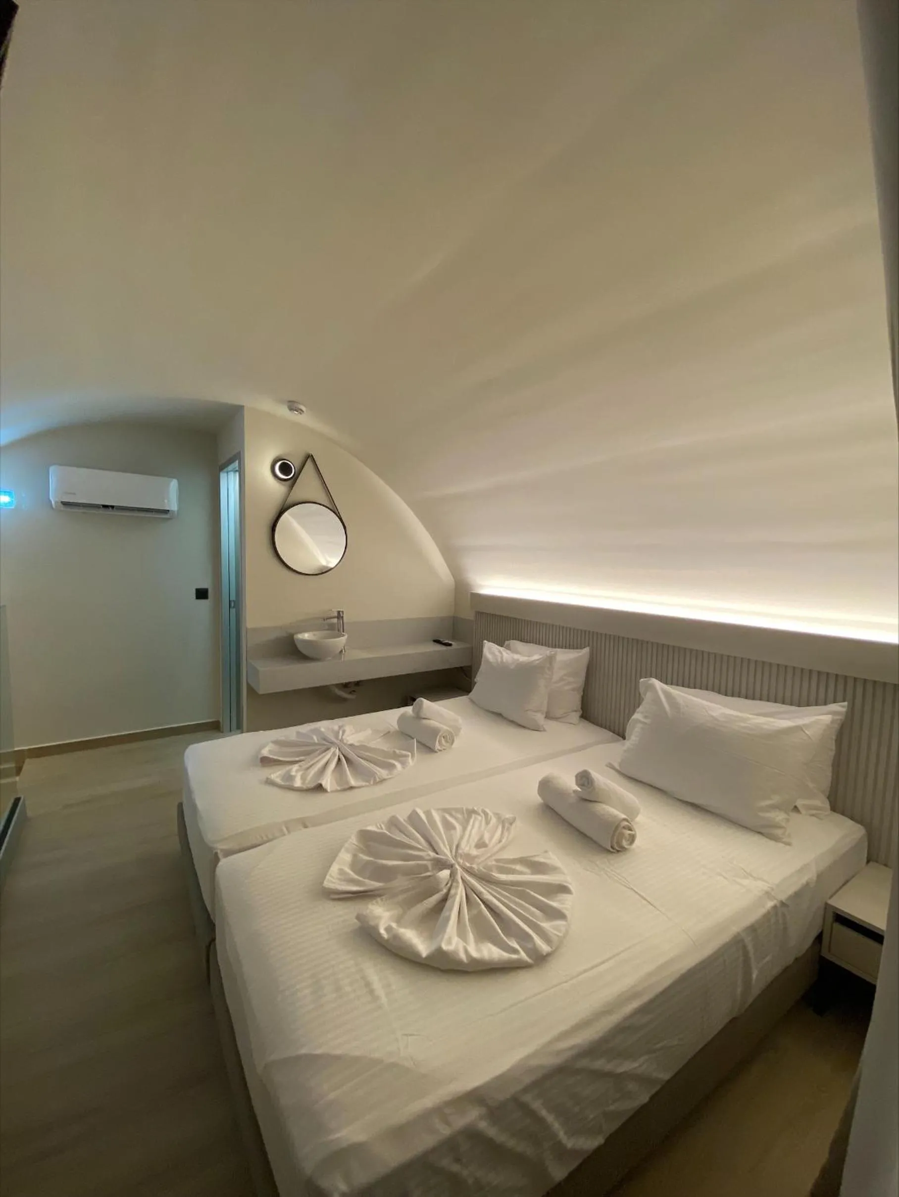 Bed in Barbie Hotel Apartments