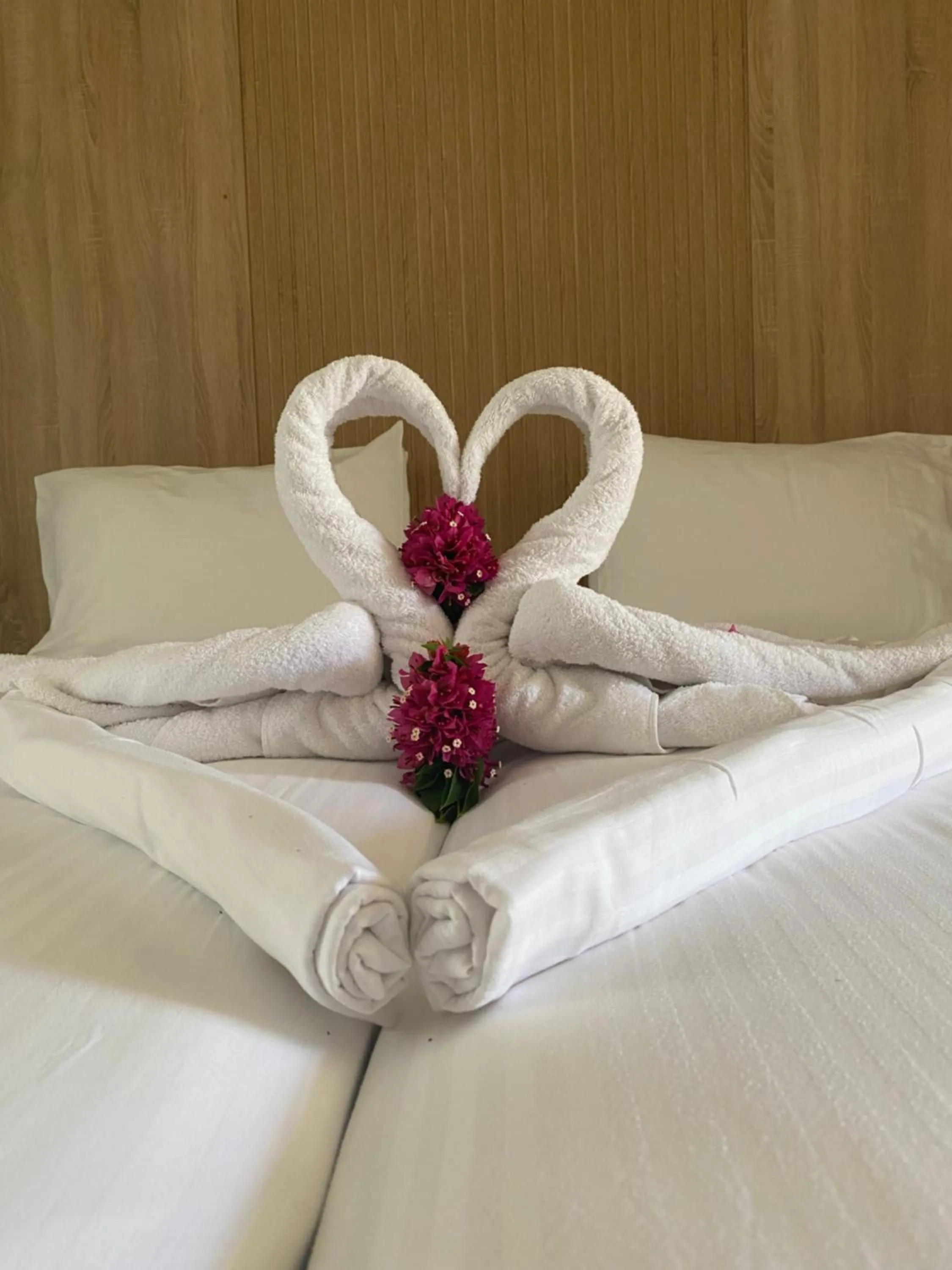 Bed in Barbie Hotel Apartments