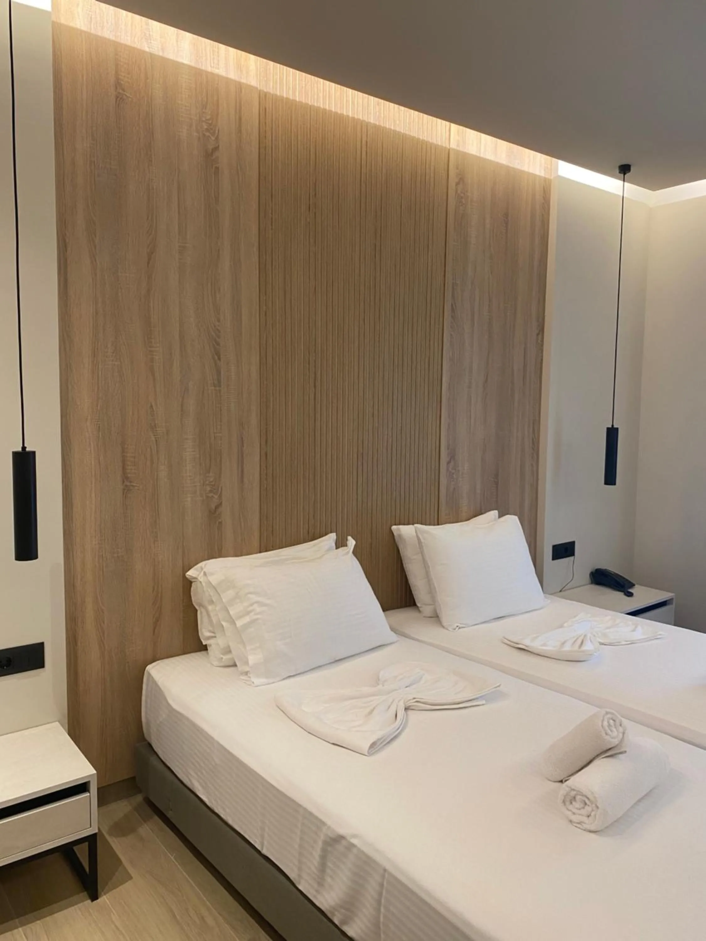 Bed in Barbie Hotel Apartments