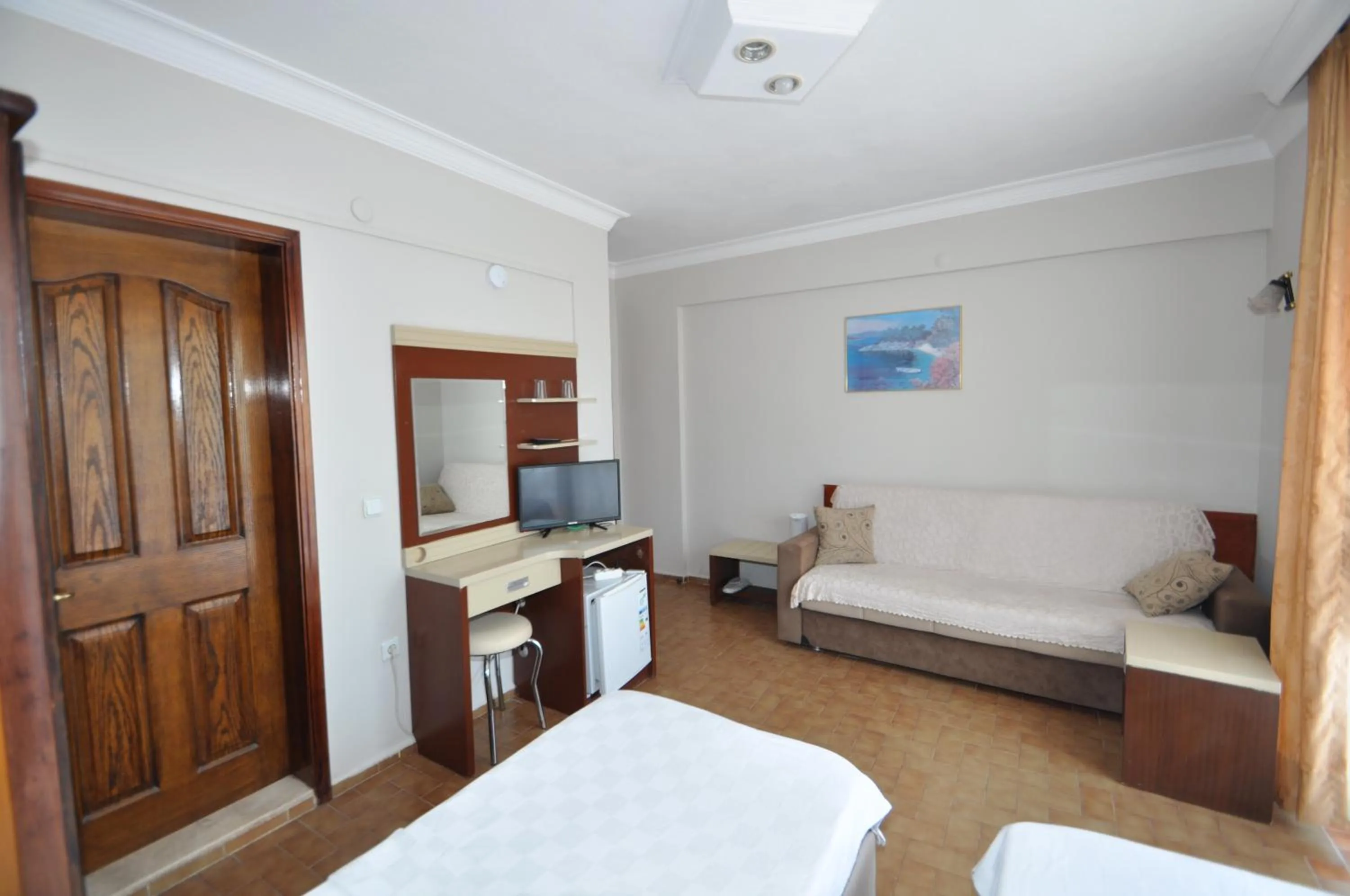 Bed in Defne & Zevkim Hotel