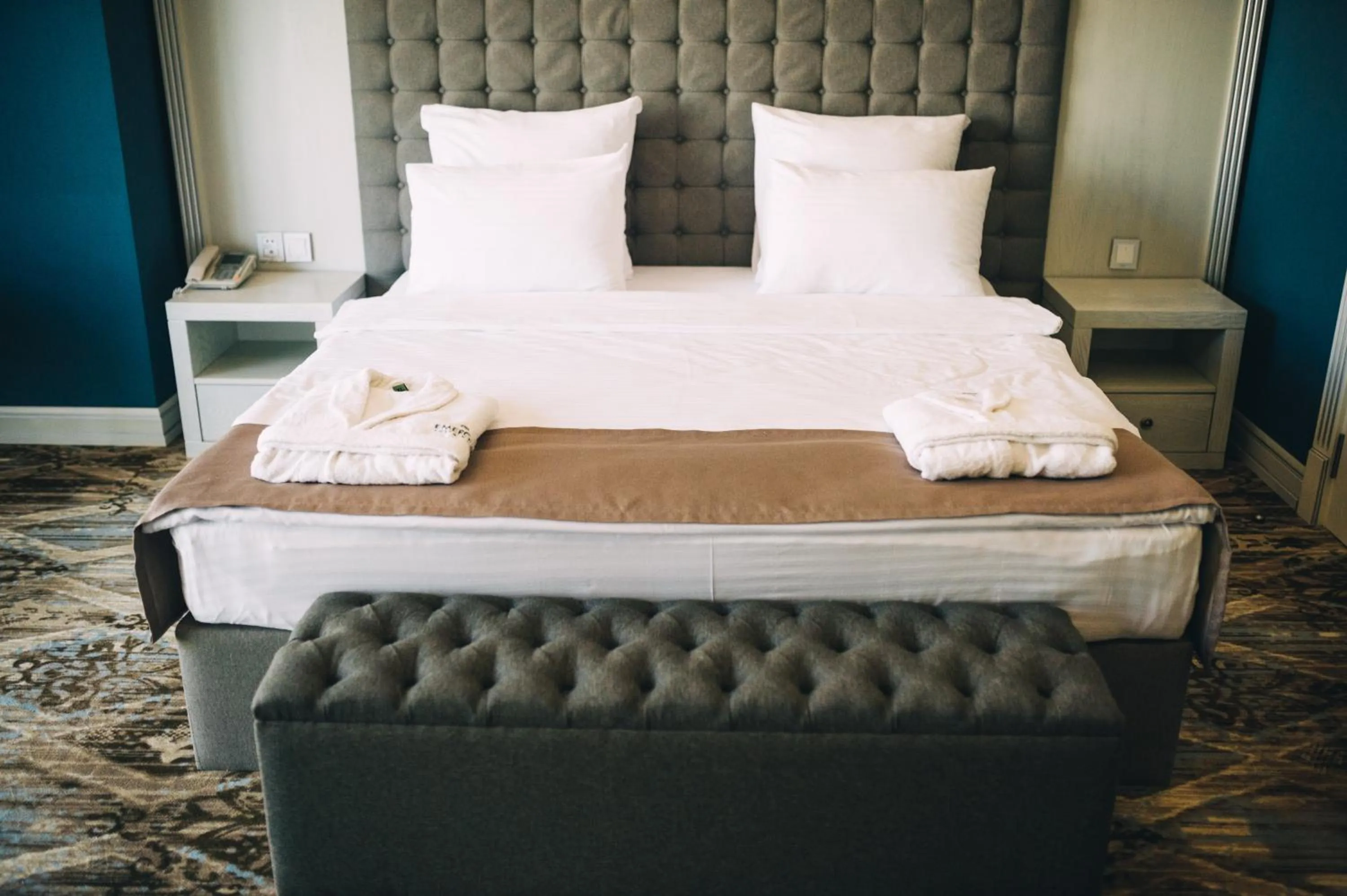 Bed in Emerald Suite Hotel