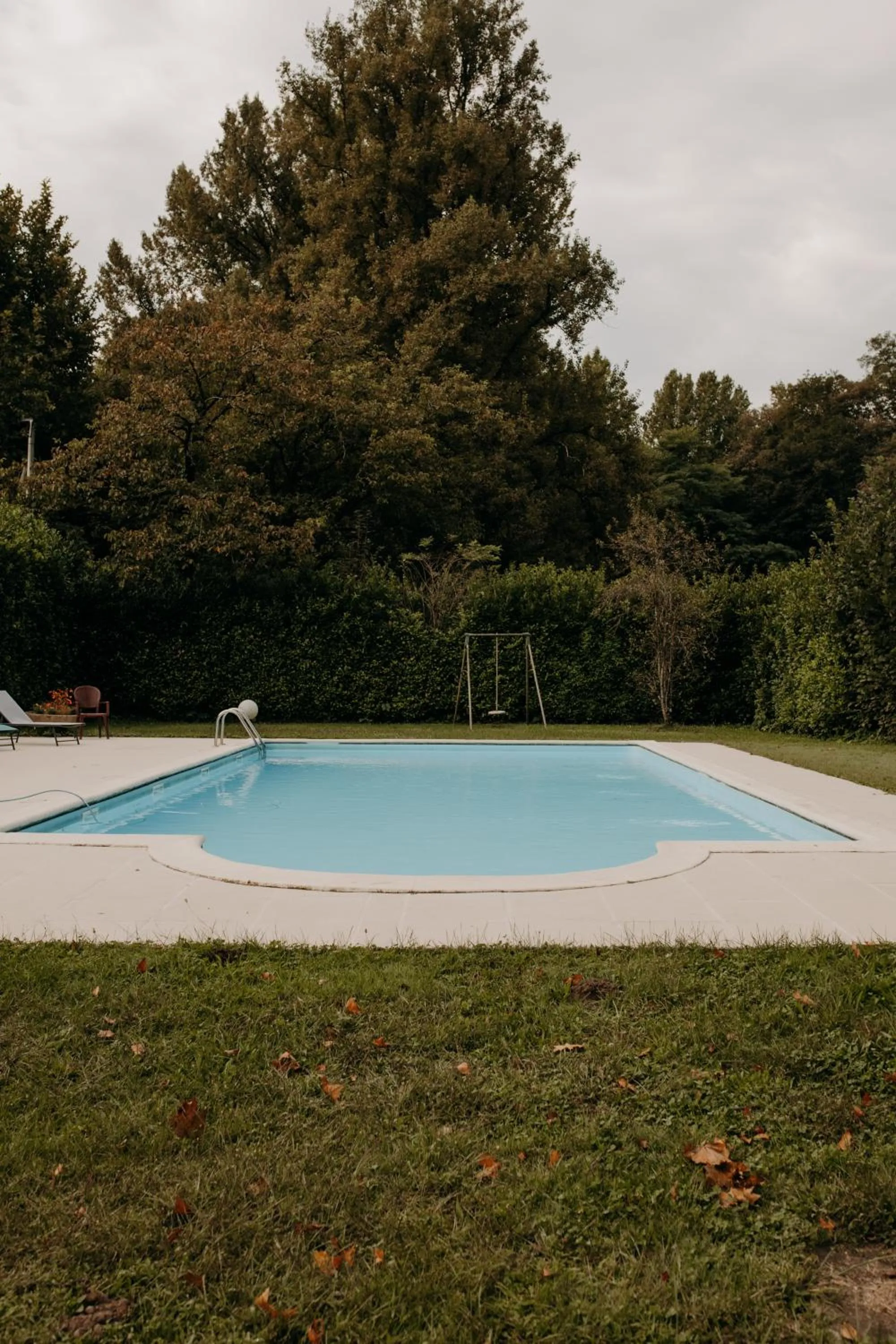 Swimming pool in Logis - Hotel Restaurant du Parc