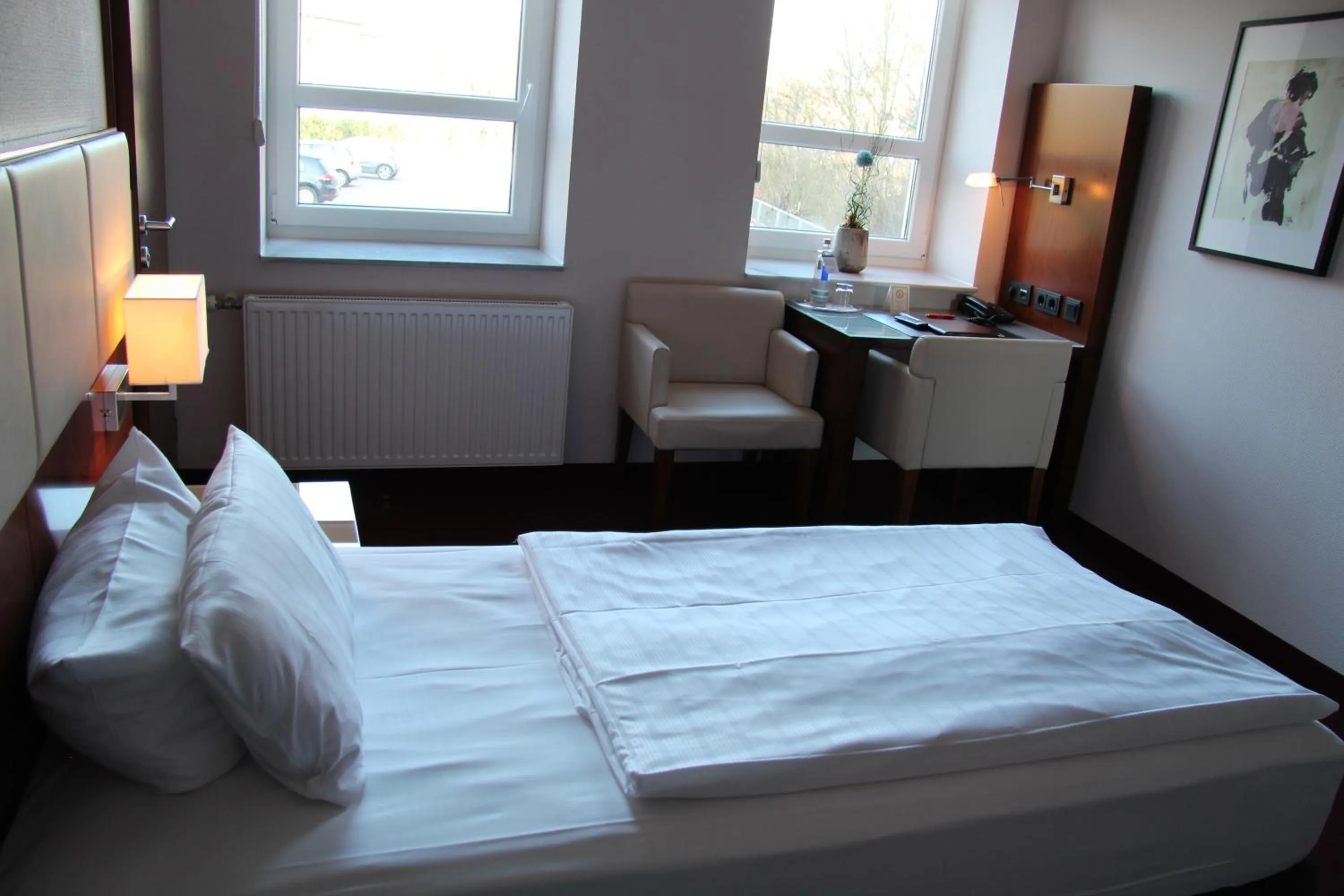 Photo of the whole room, Bed in Adena Hotel