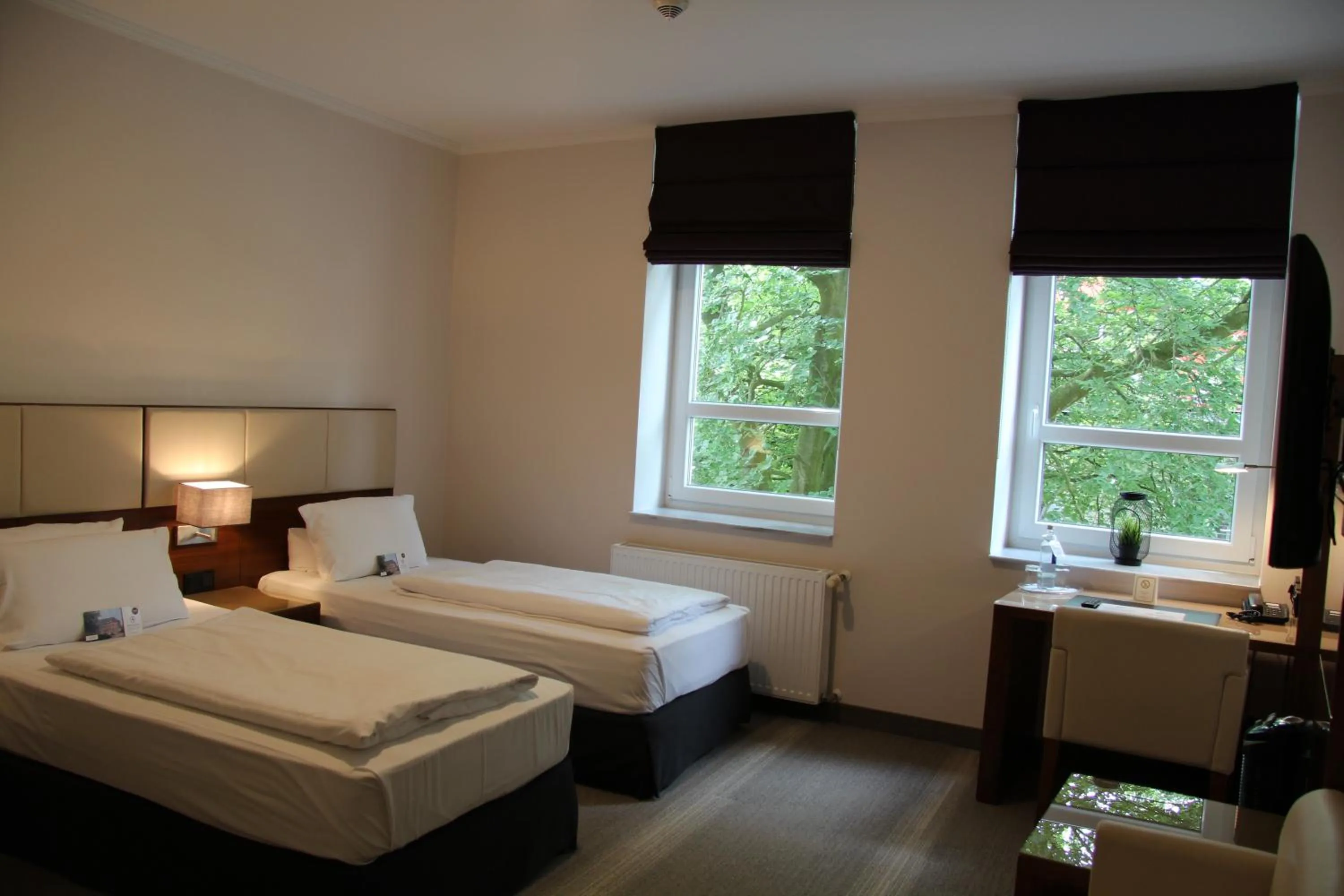 Photo of the whole room, Bed in Adena Hotel