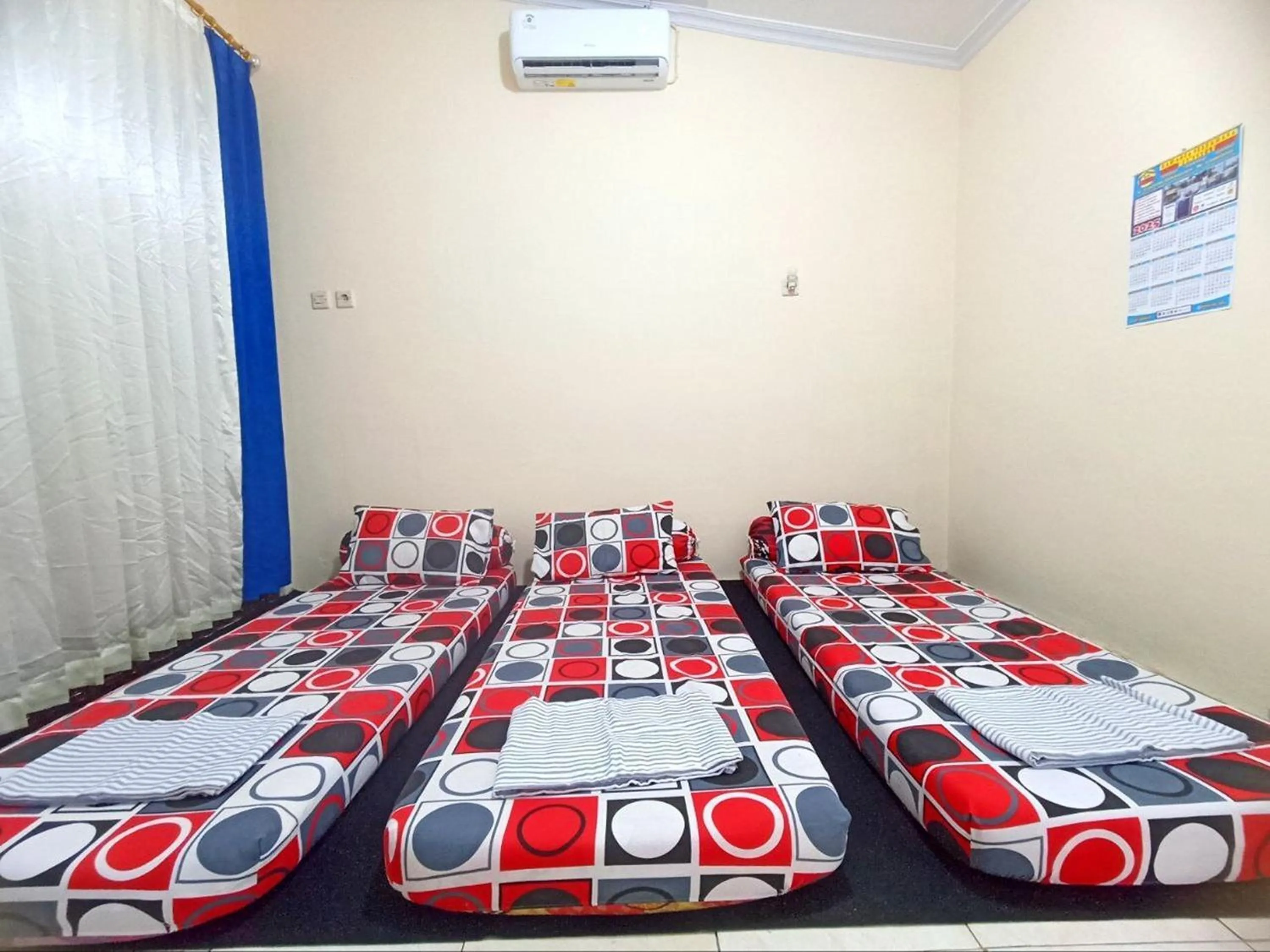 Bed in Bahagia Sederhana Homestay