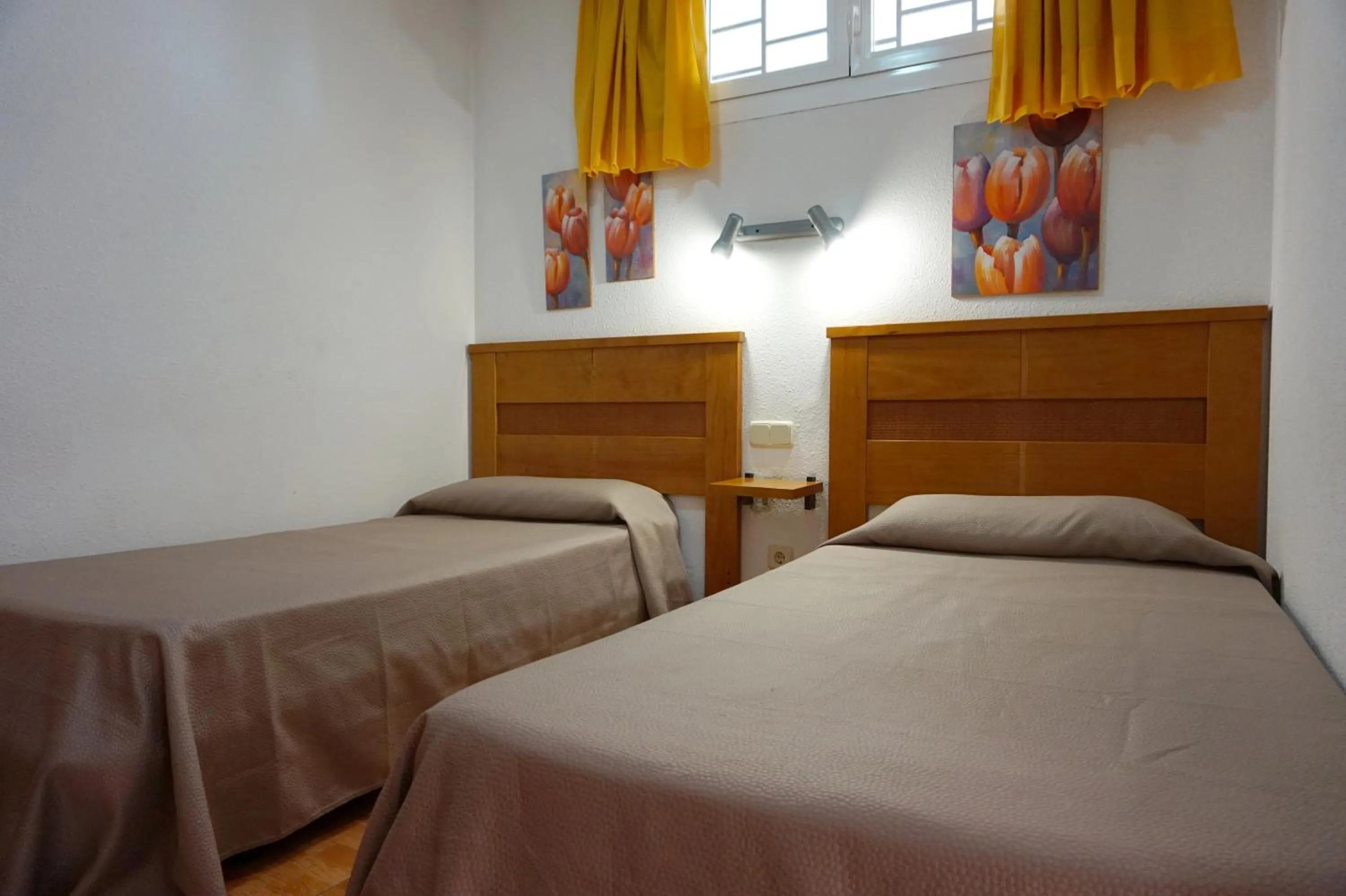 Bed in Apartamentos Ecuador