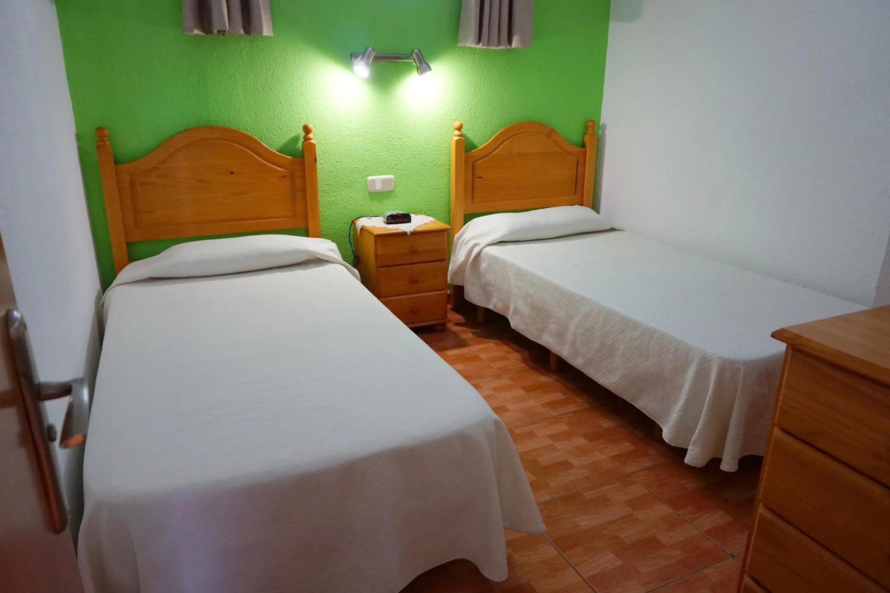 Bed in Apartamentos Ecuador