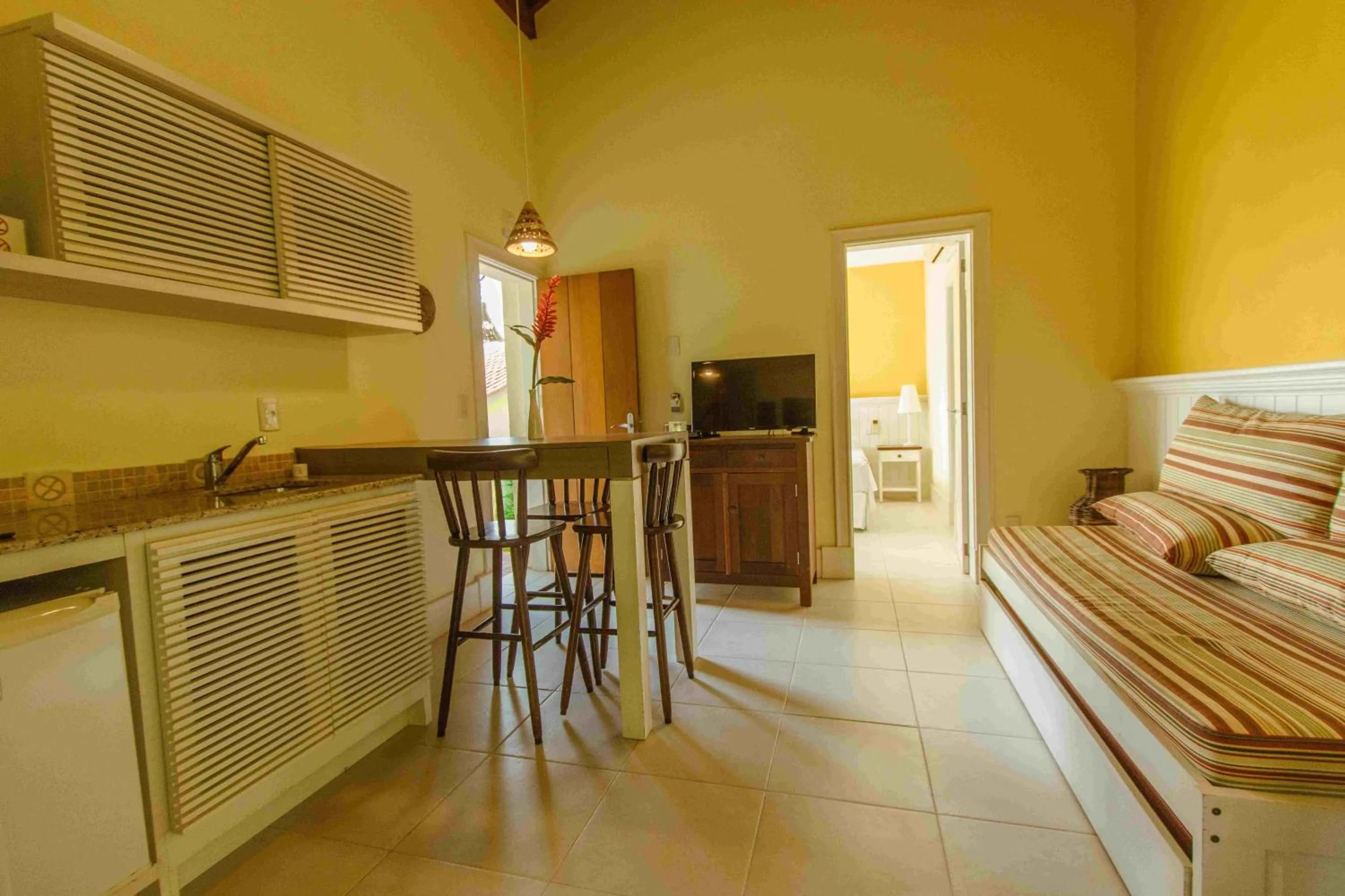 Kitchen or kitchenette in Pousada Vila do Bosque