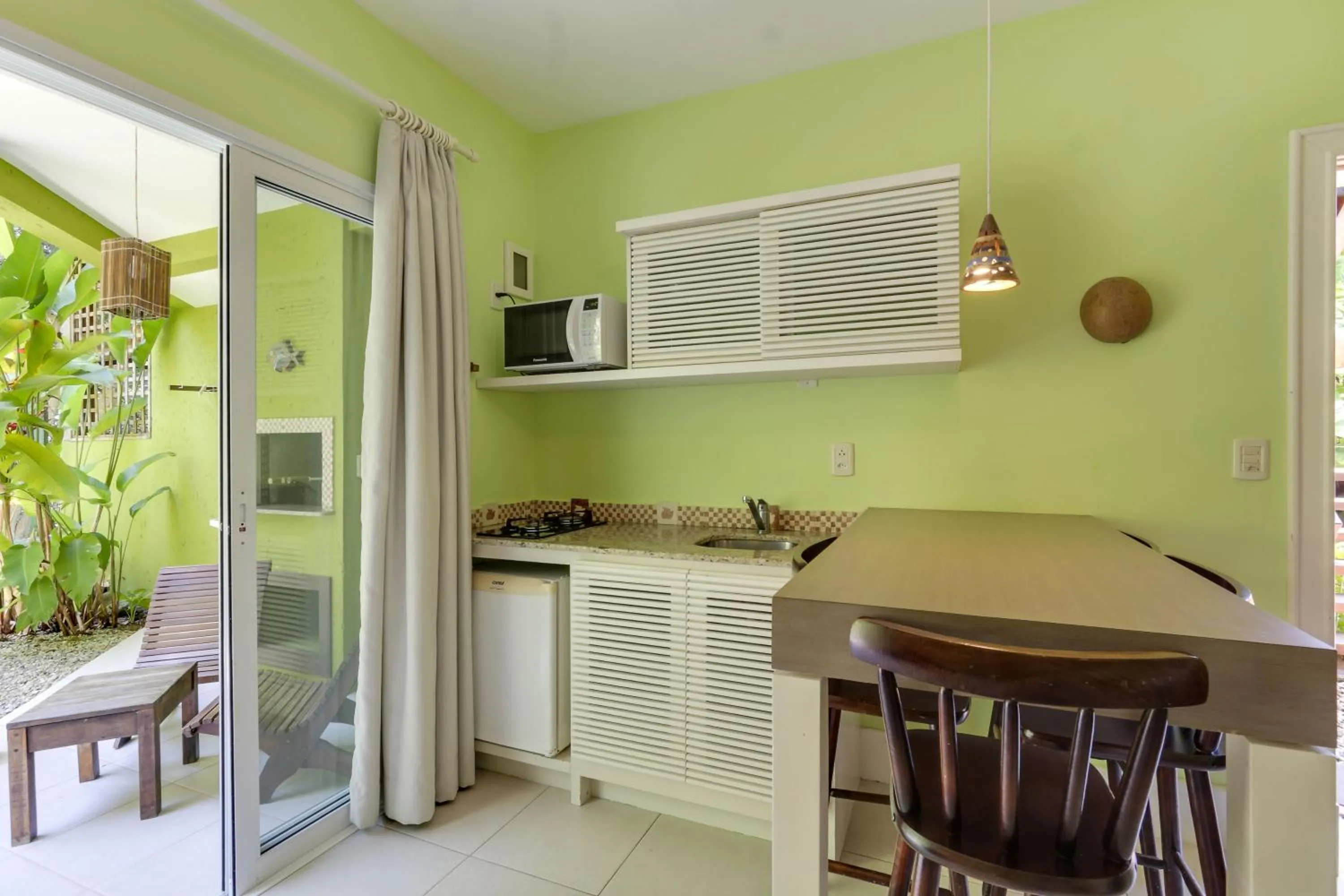 Kitchen or kitchenette in Pousada Vila do Bosque