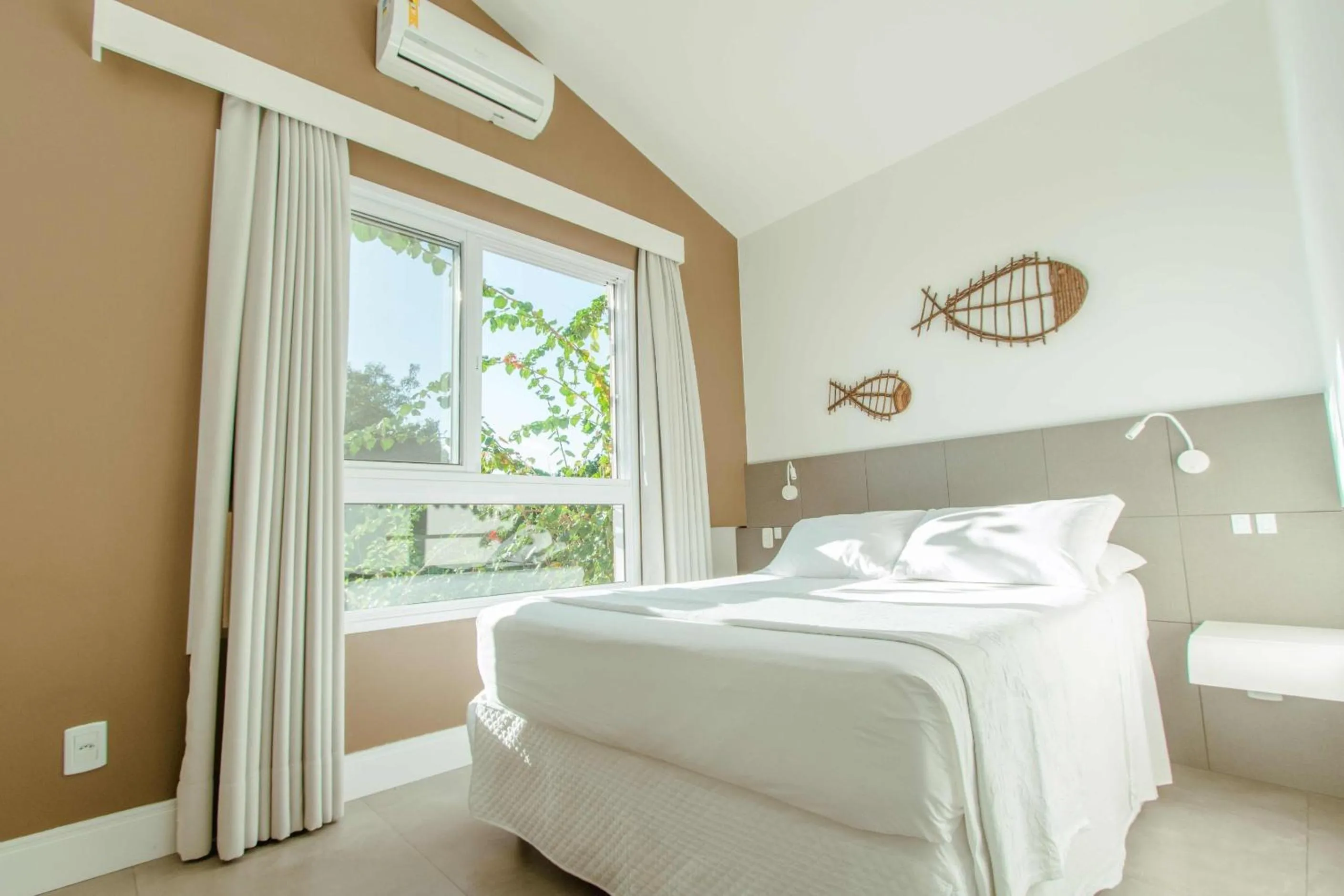 Bed in Pousada Vila do Bosque