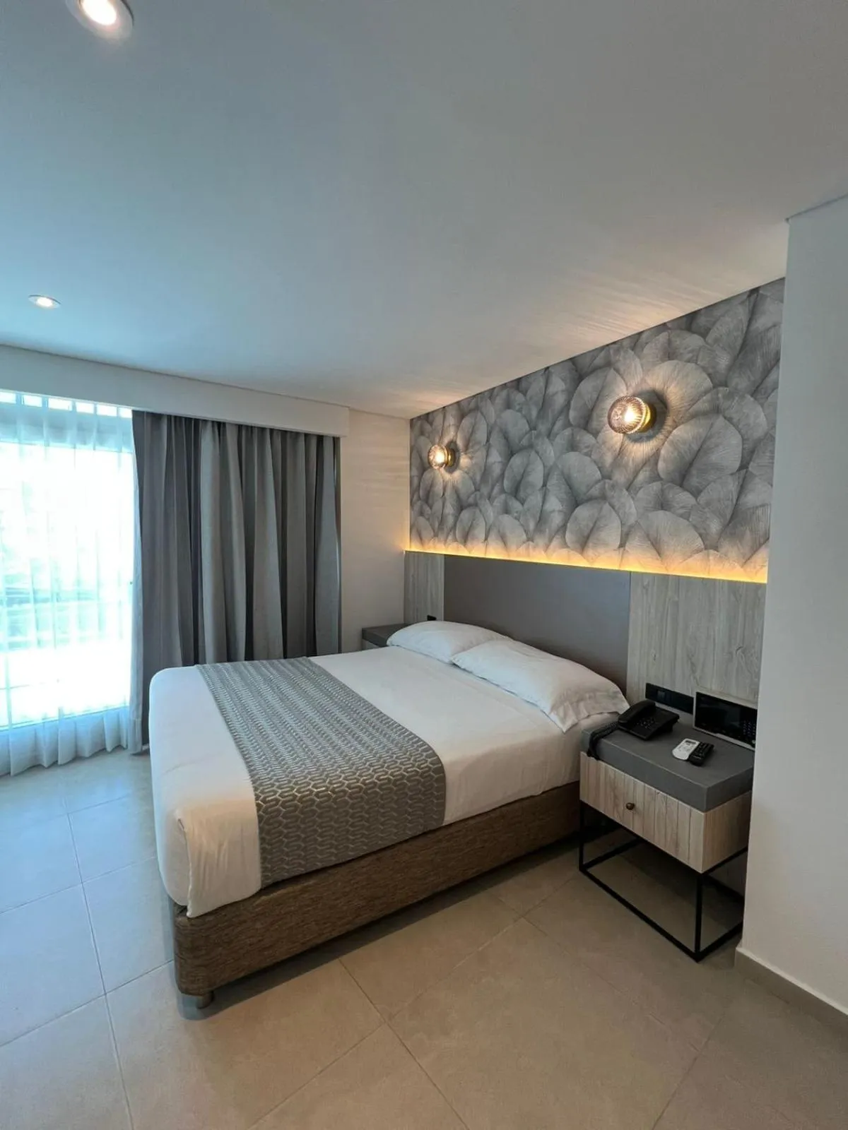 Bed in Zi One Luxury Hotel