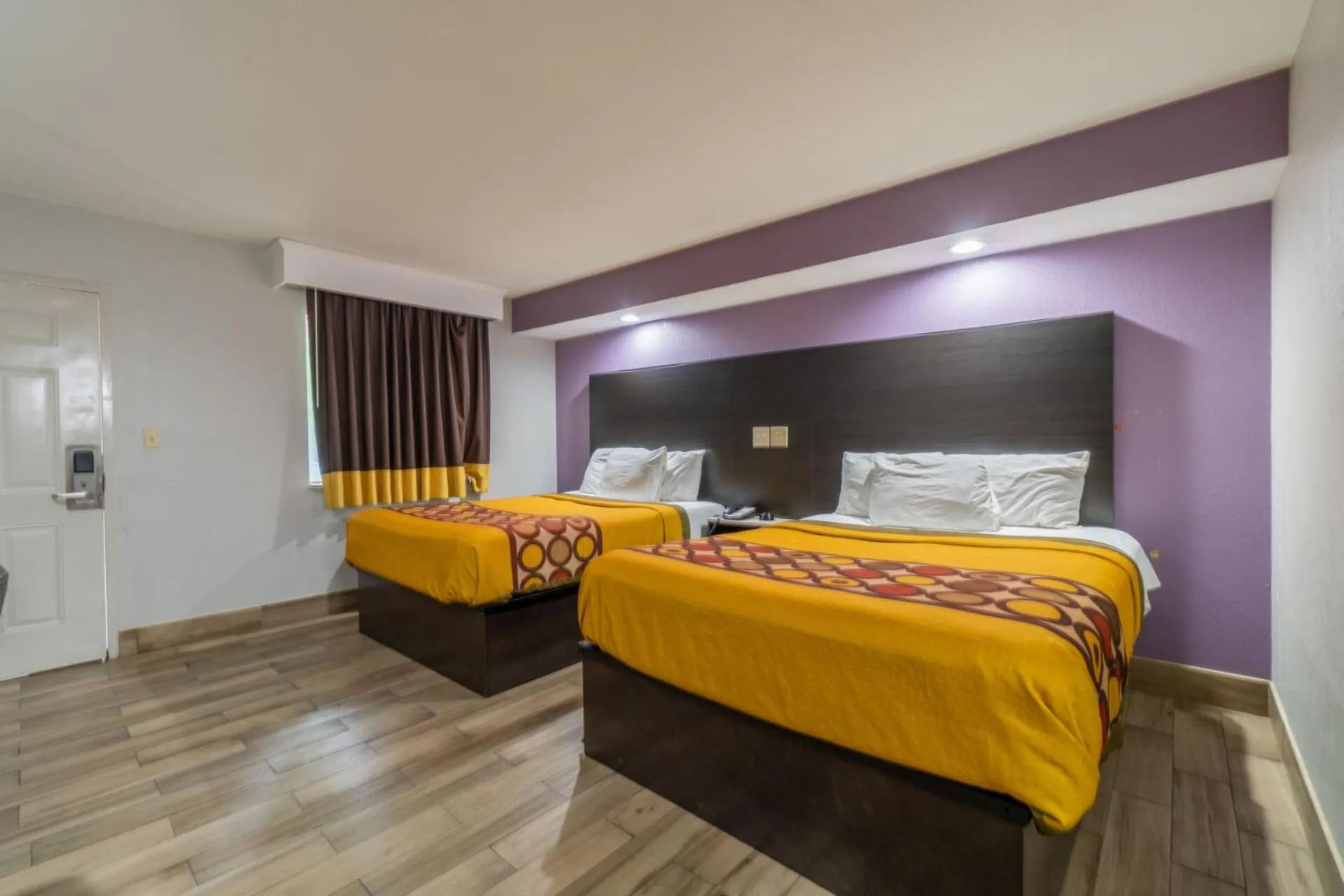 Bed in Holiday Terrace Motel