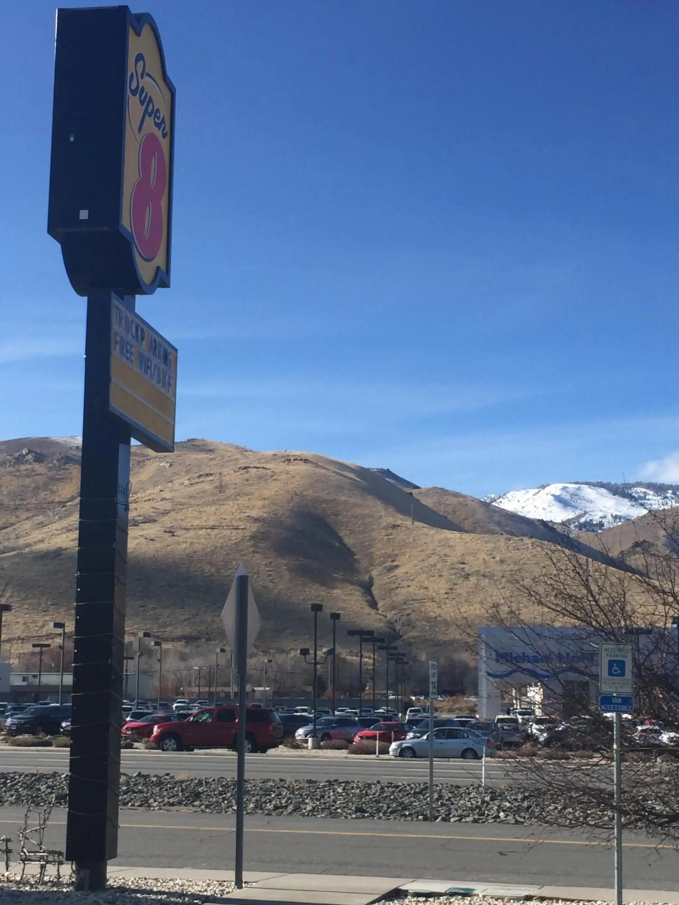 Property logo or sign in Super 8 by Wyndham Carson City Lake Tahoe