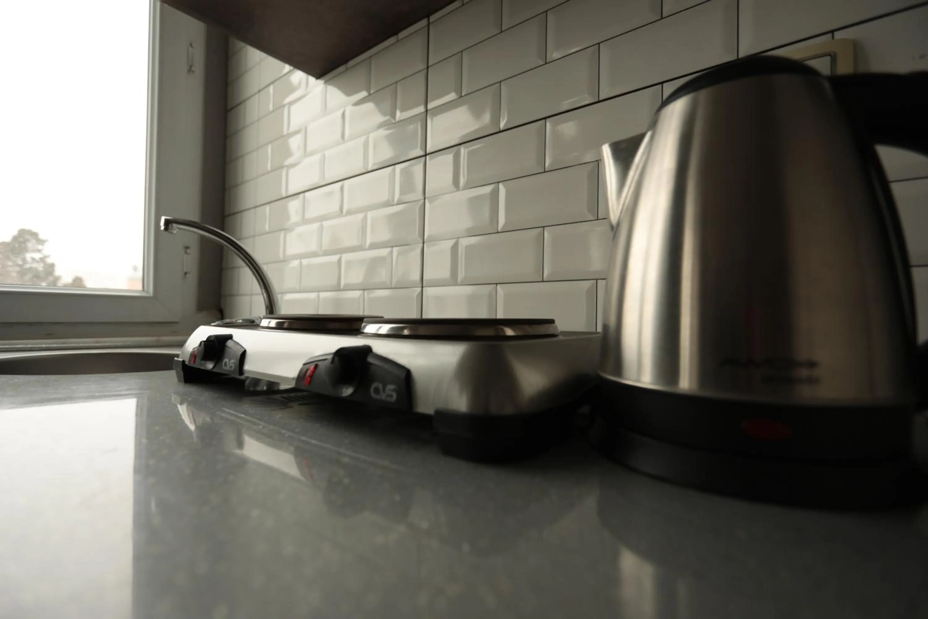 kitchen in White Pearl Apart Hotel