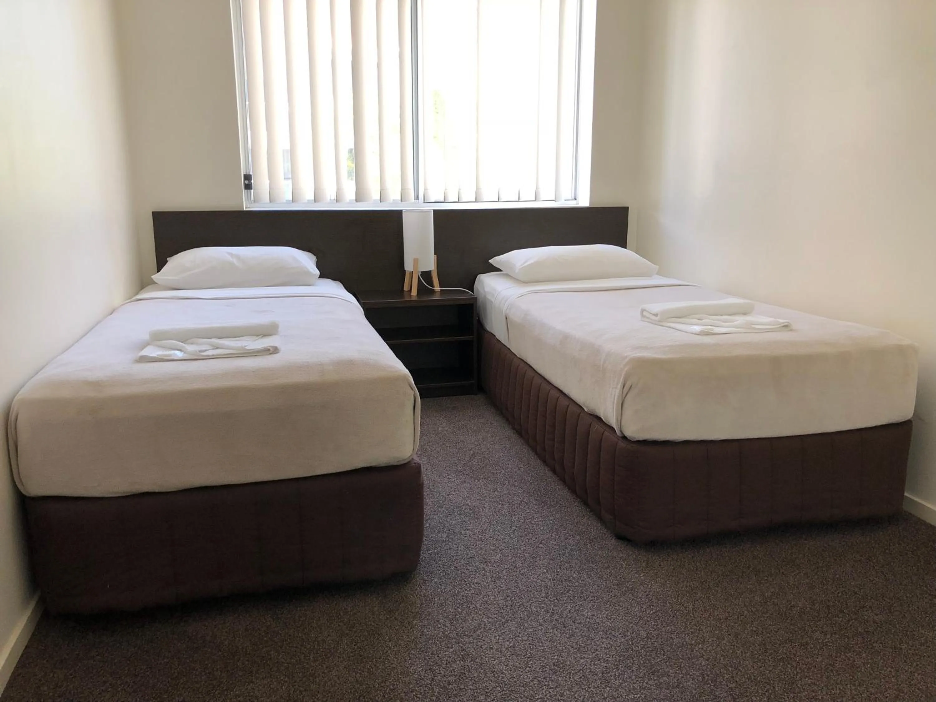 Bed in Splendido Resort Apartments