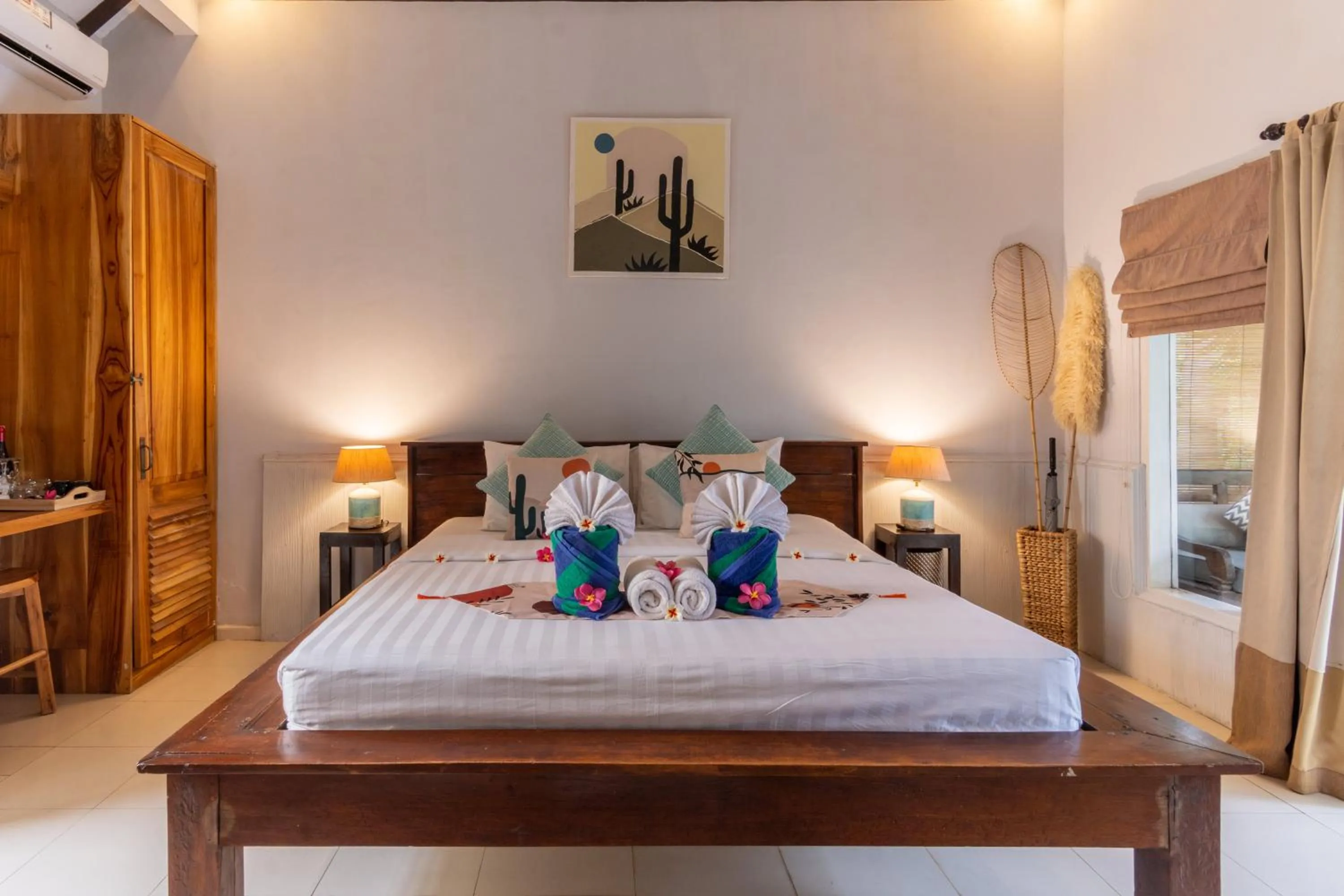 Bed in Bale Sampan Boutique Bungalows