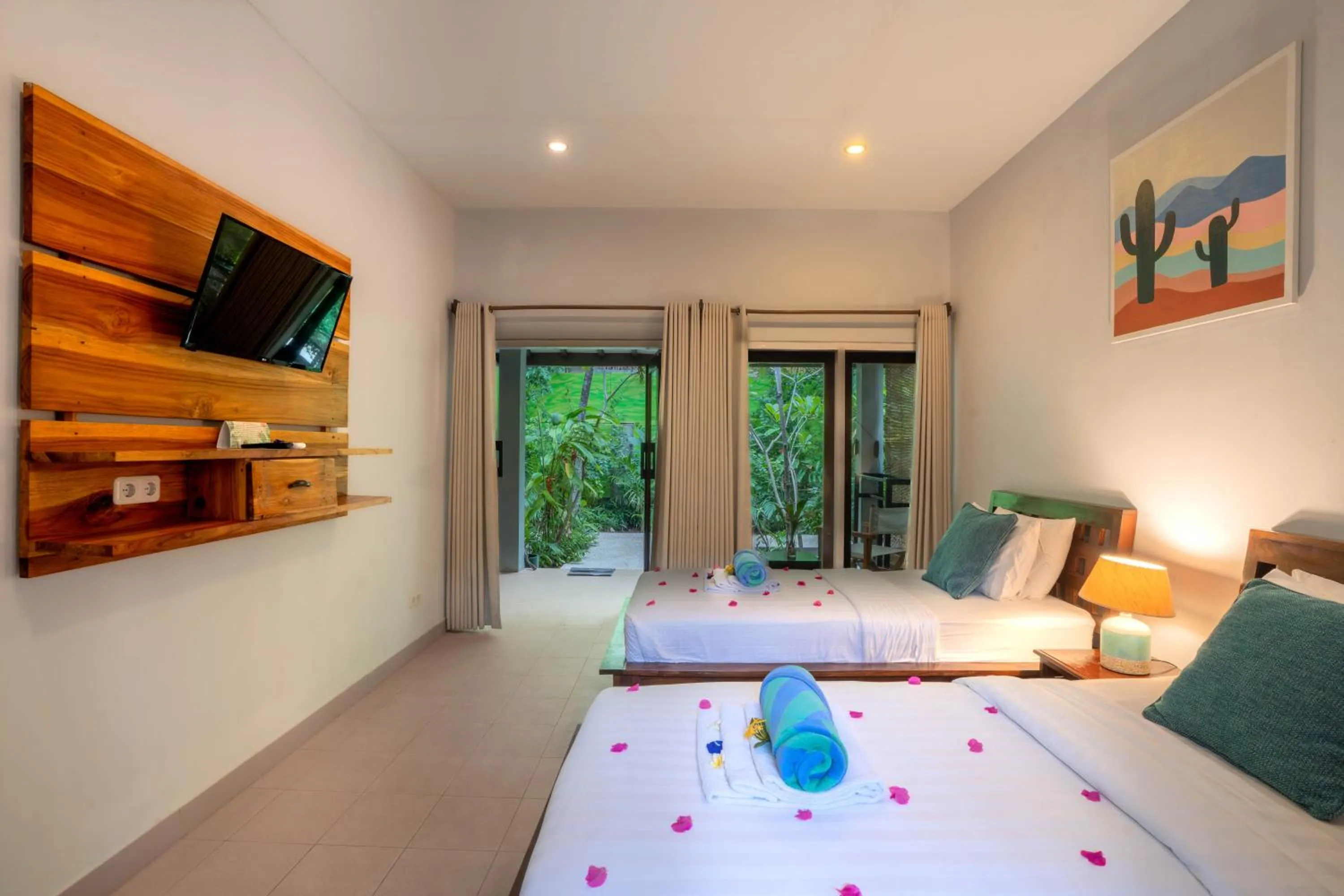 Bed in Bale Sampan Boutique Bungalows