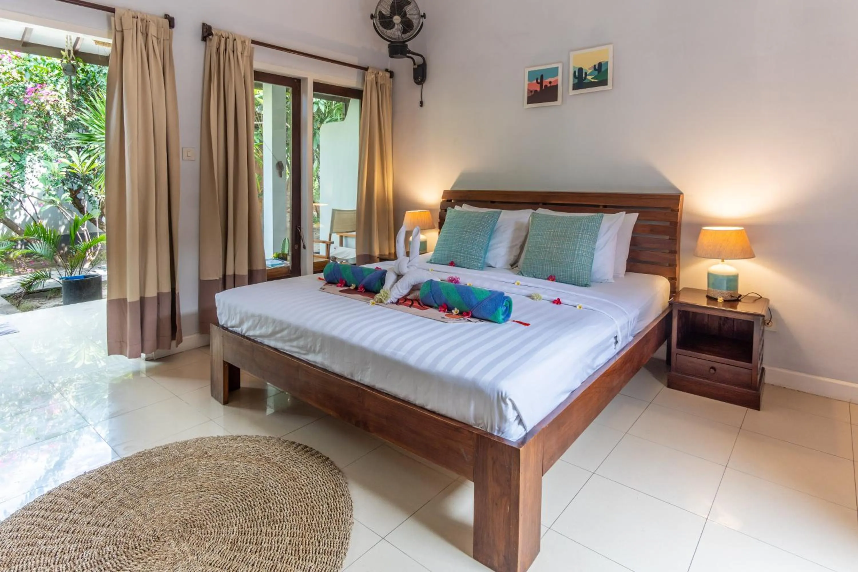 Bed in Bale Sampan Boutique Bungalows