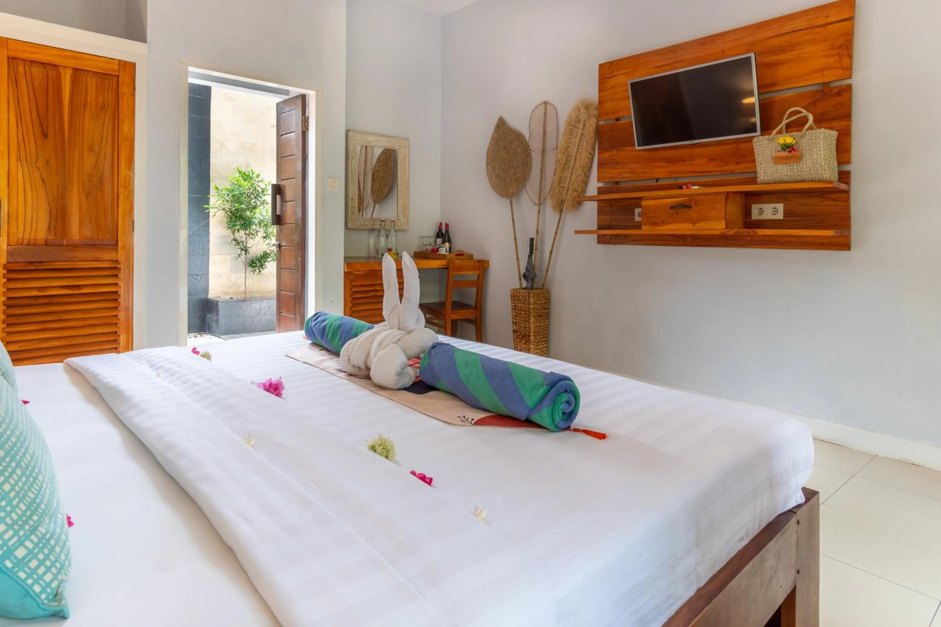 Bed in Bale Sampan Boutique Bungalows