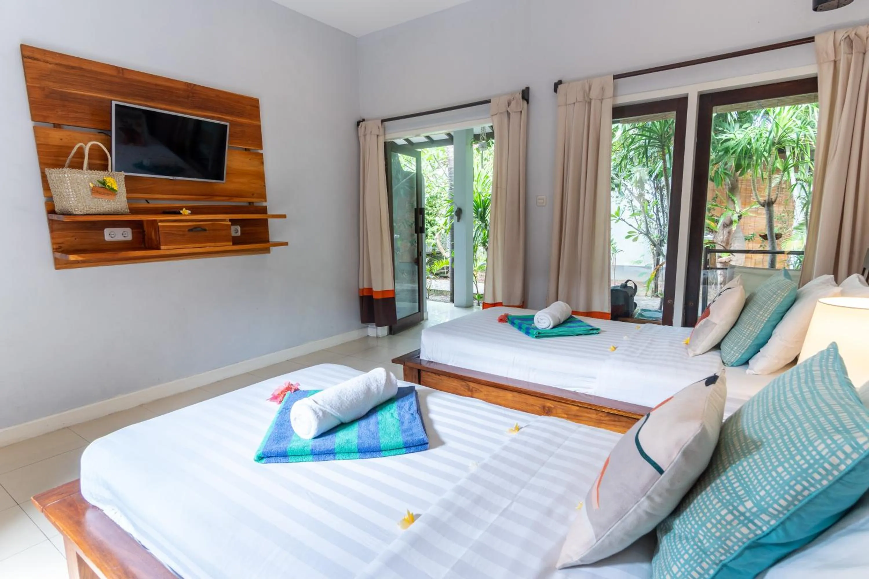 Bed in Bale Sampan Boutique Bungalows