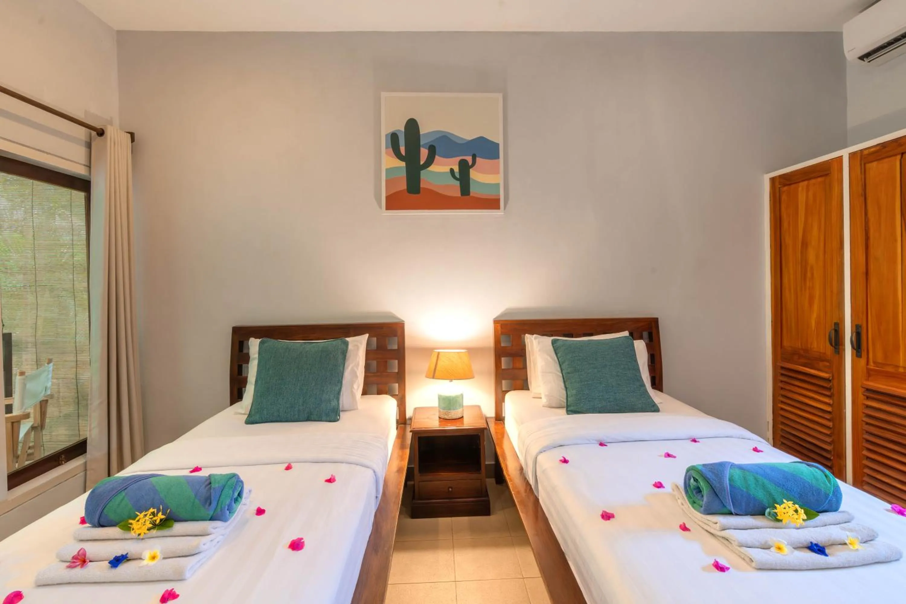 Bed in Bale Sampan Boutique Bungalows