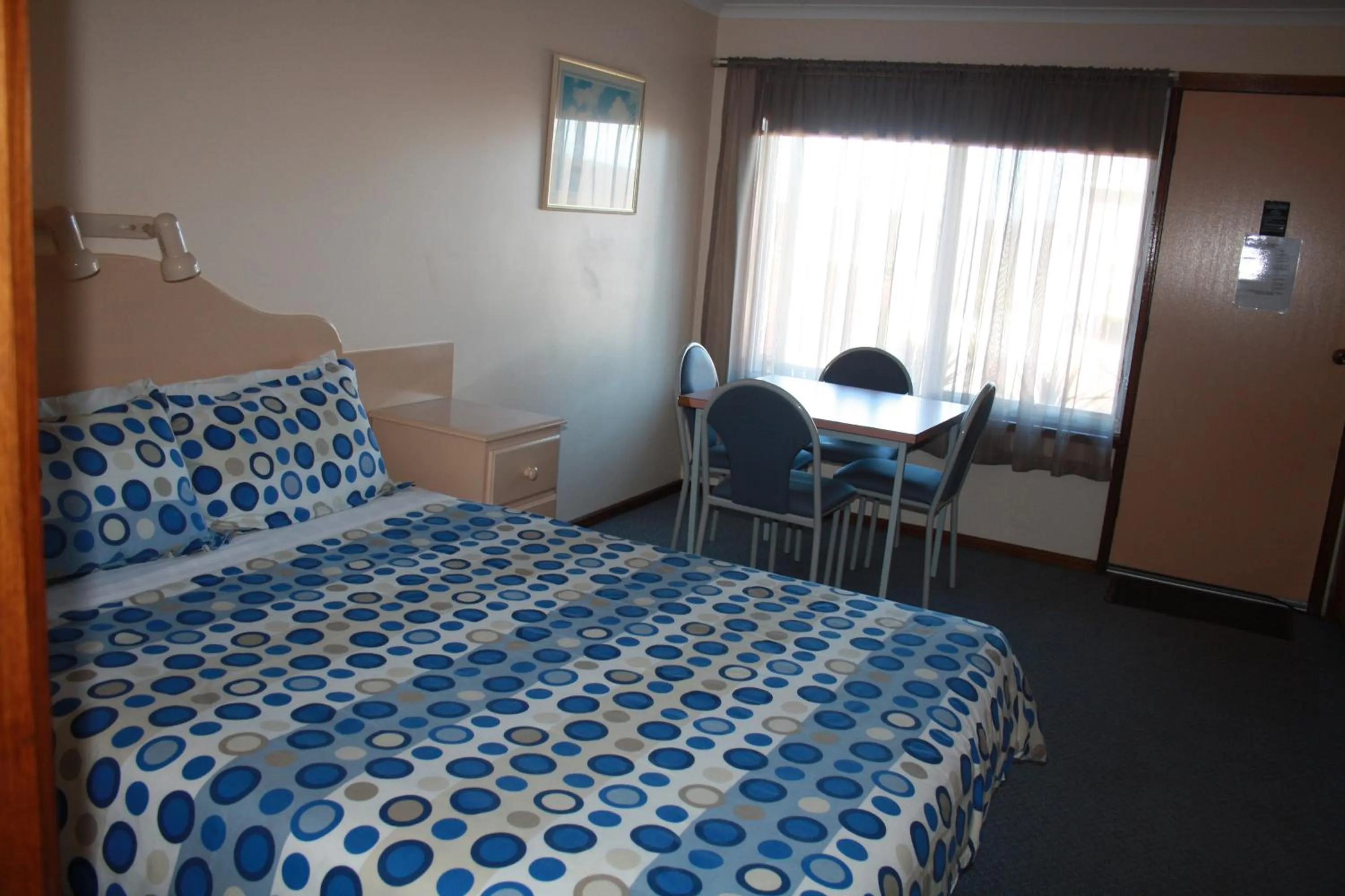 Bed in Raglan Motor Inn