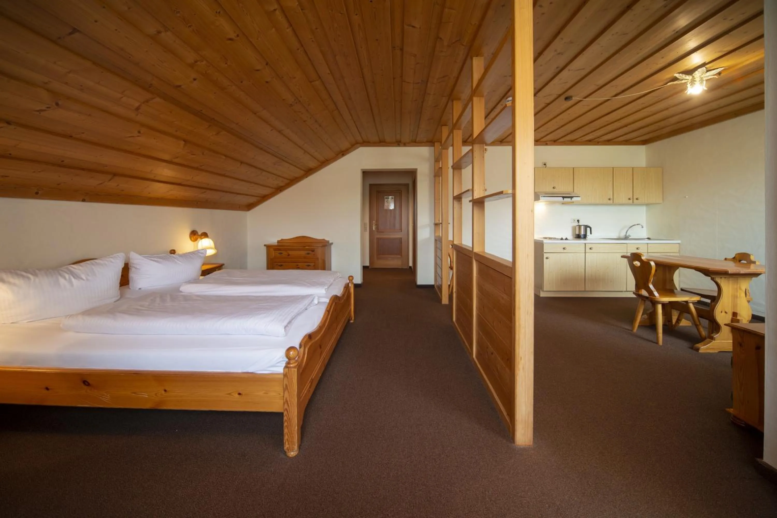 Photo of the whole room, Bed in Seehotel Weissensee