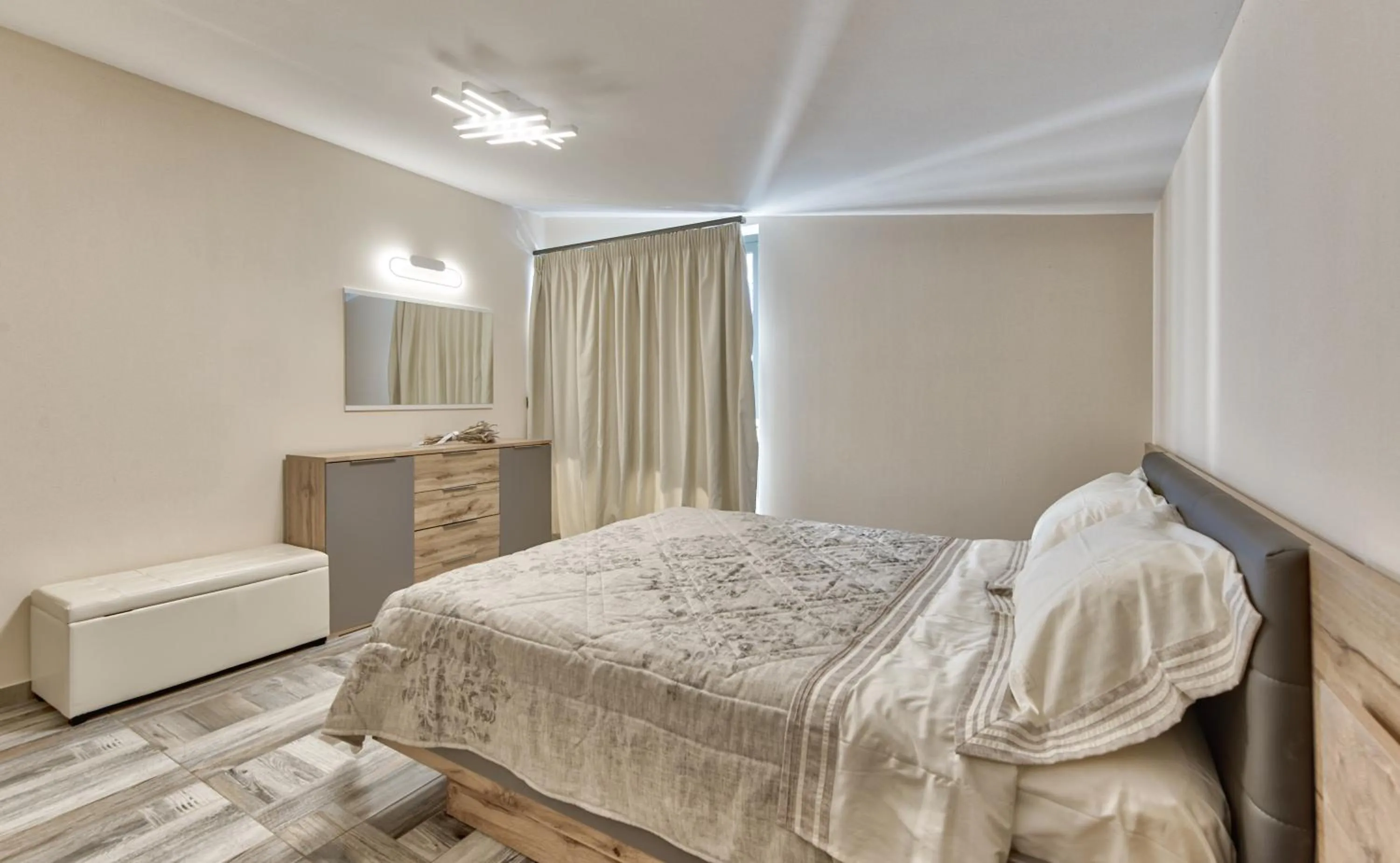 Bed in Mandala Seafront Suites