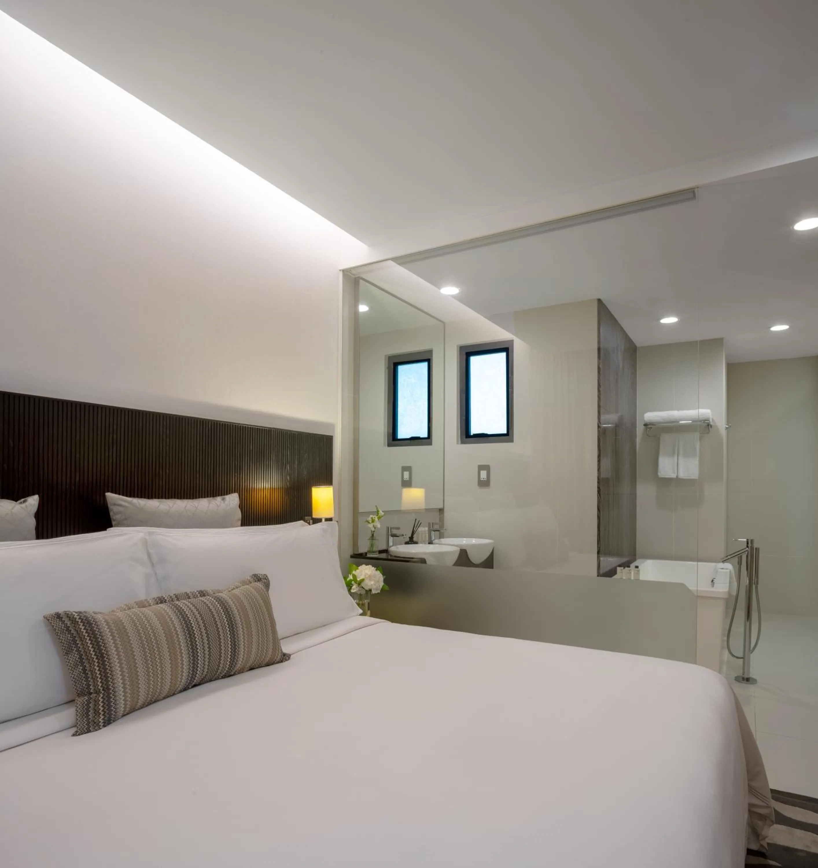 Bed in Fraser Suites Singapore