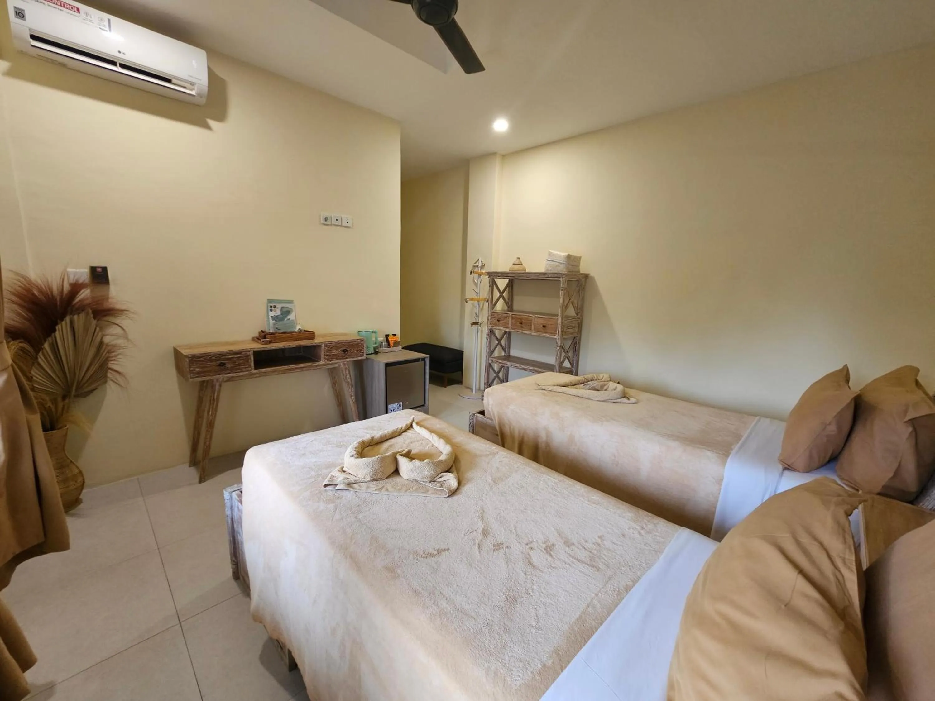 Bed in ISLA INDAH RETREAT boutique hotel