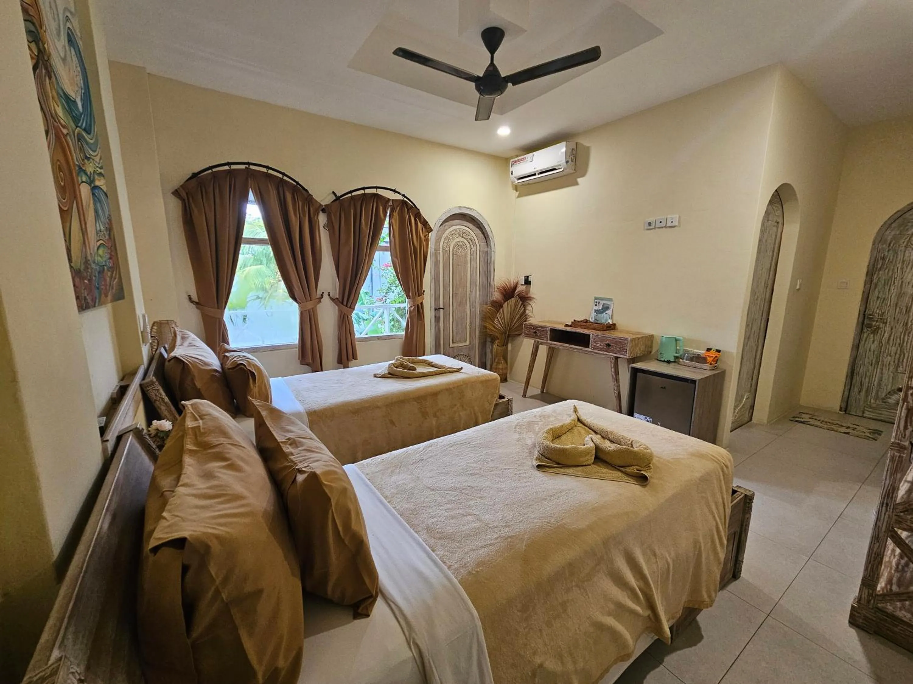 Bed in ISLA INDAH RETREAT boutique hotel