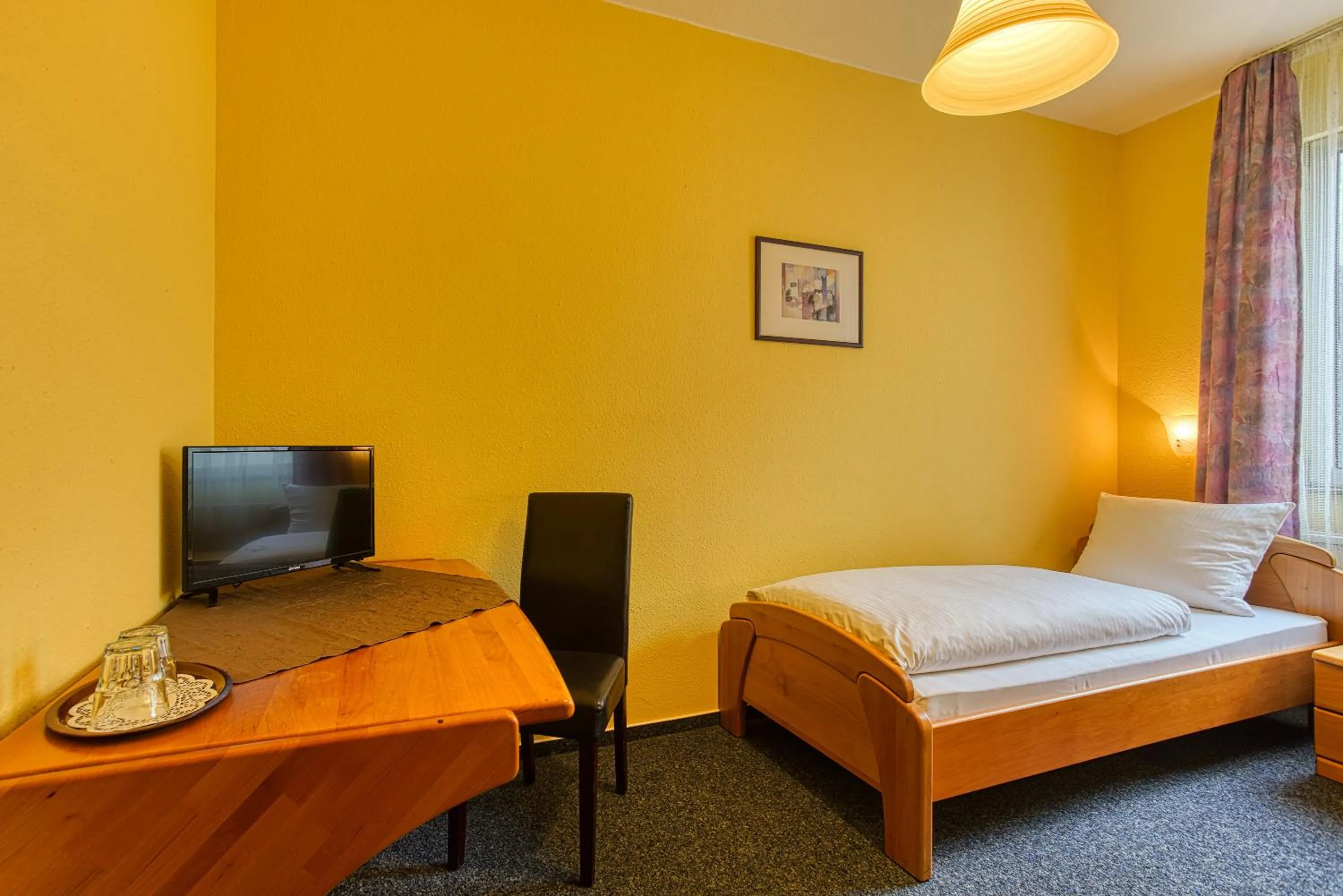 Bed in Hotel Carlton