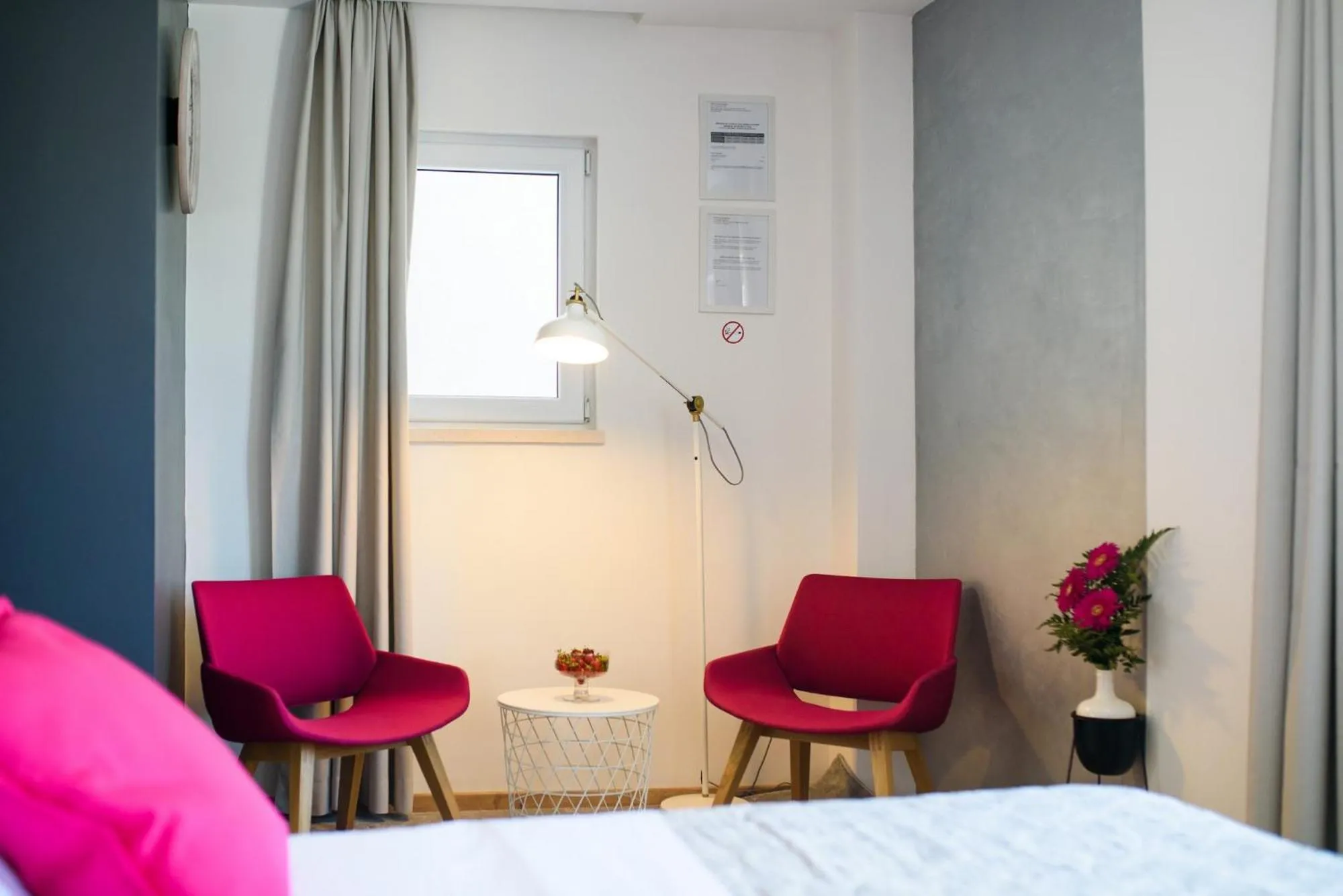 Seating area, Bed in Ora Luxury Rooms