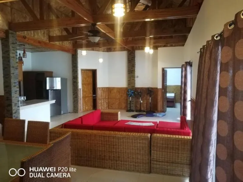 Communal lounge/ TV room, Bed in Villa de Pico Highland Beach Resort