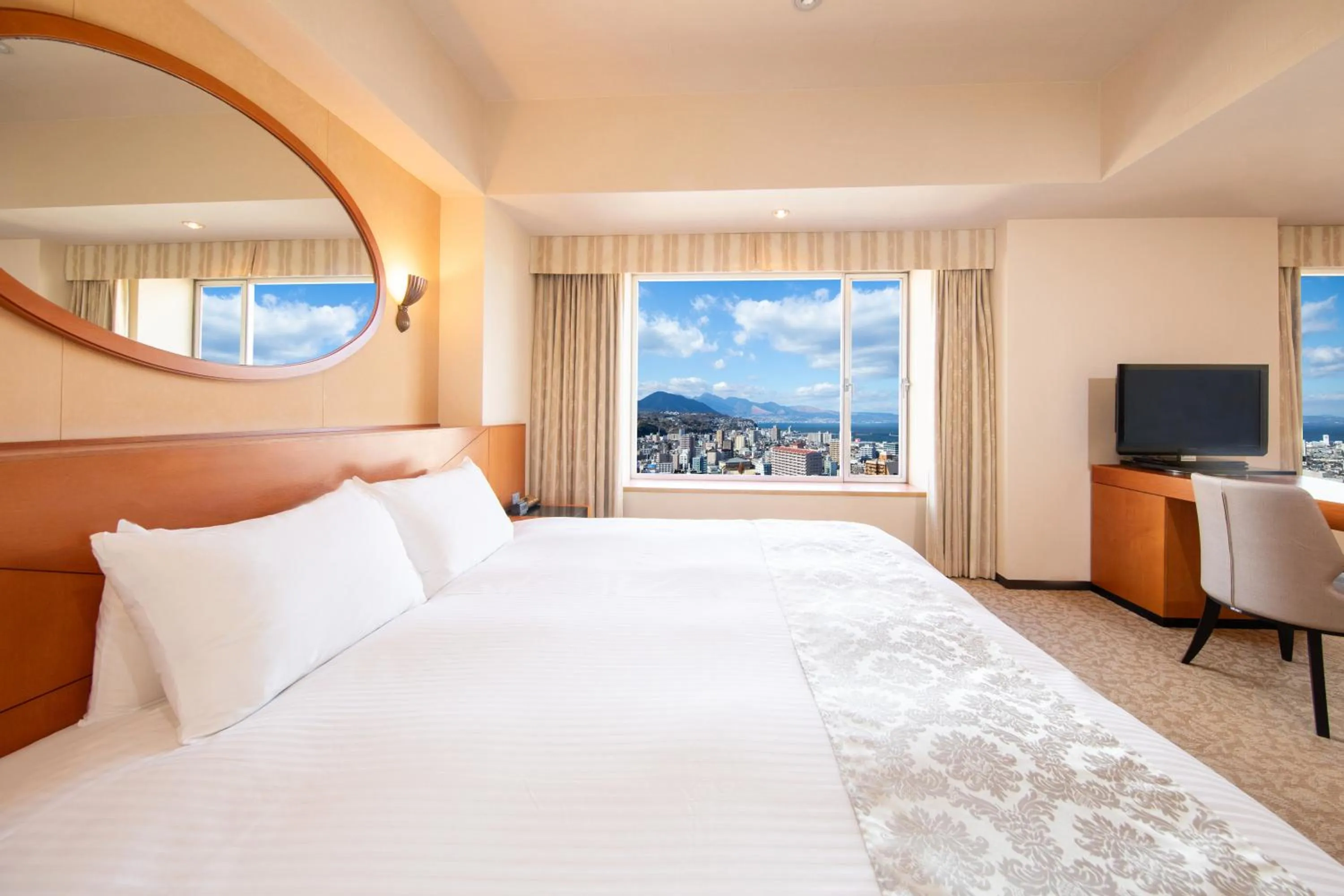 City view, Bed in Hotel Nikko Oita Oasis Tower