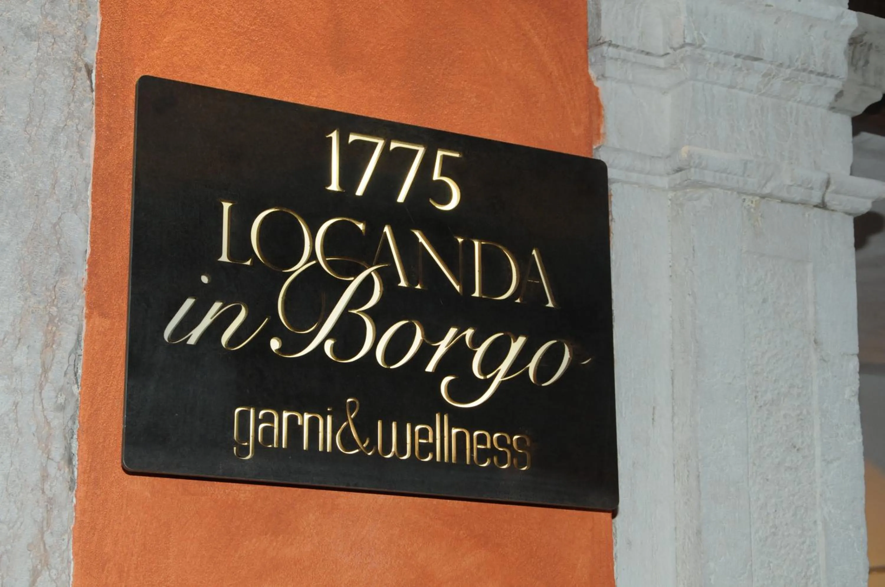 Property logo or sign in Locanda In Borgo Garnì & Wellness