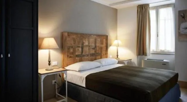 Bed in Locanda In Borgo Garnì & Wellness