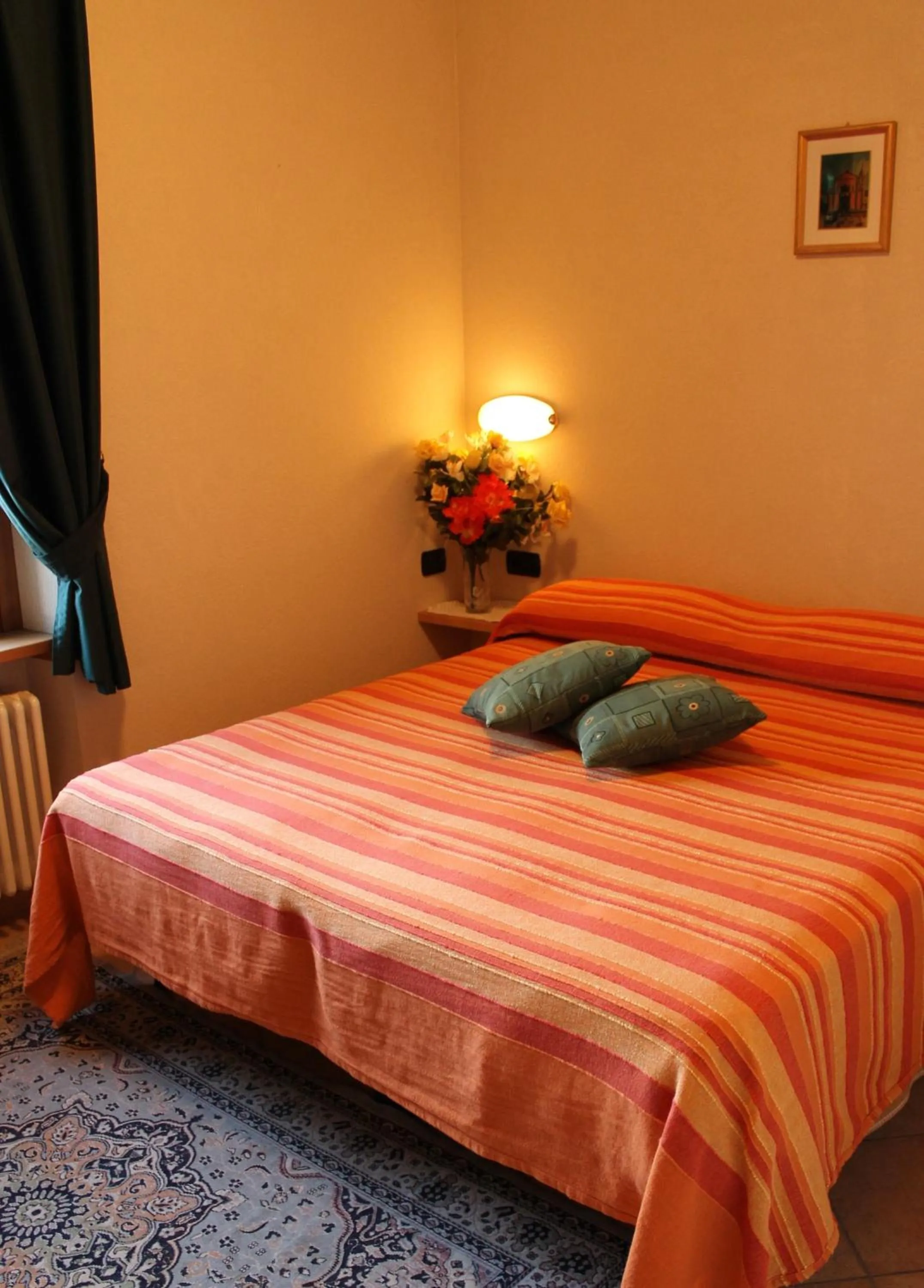 Bedroom in Hotel La Colombina