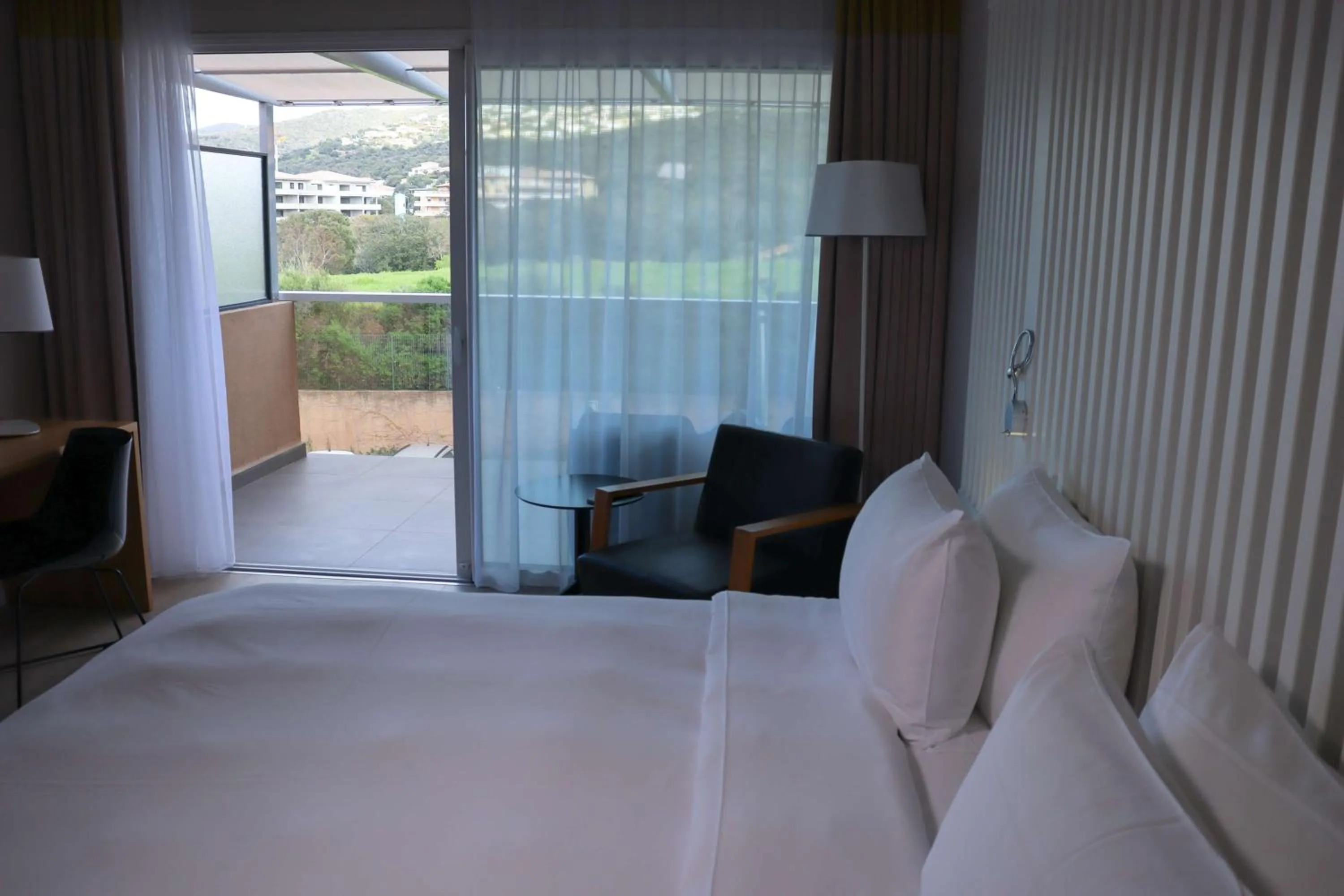 Bedroom, Bed in Radisson Blu Resort & Spa, Ajaccio Bay