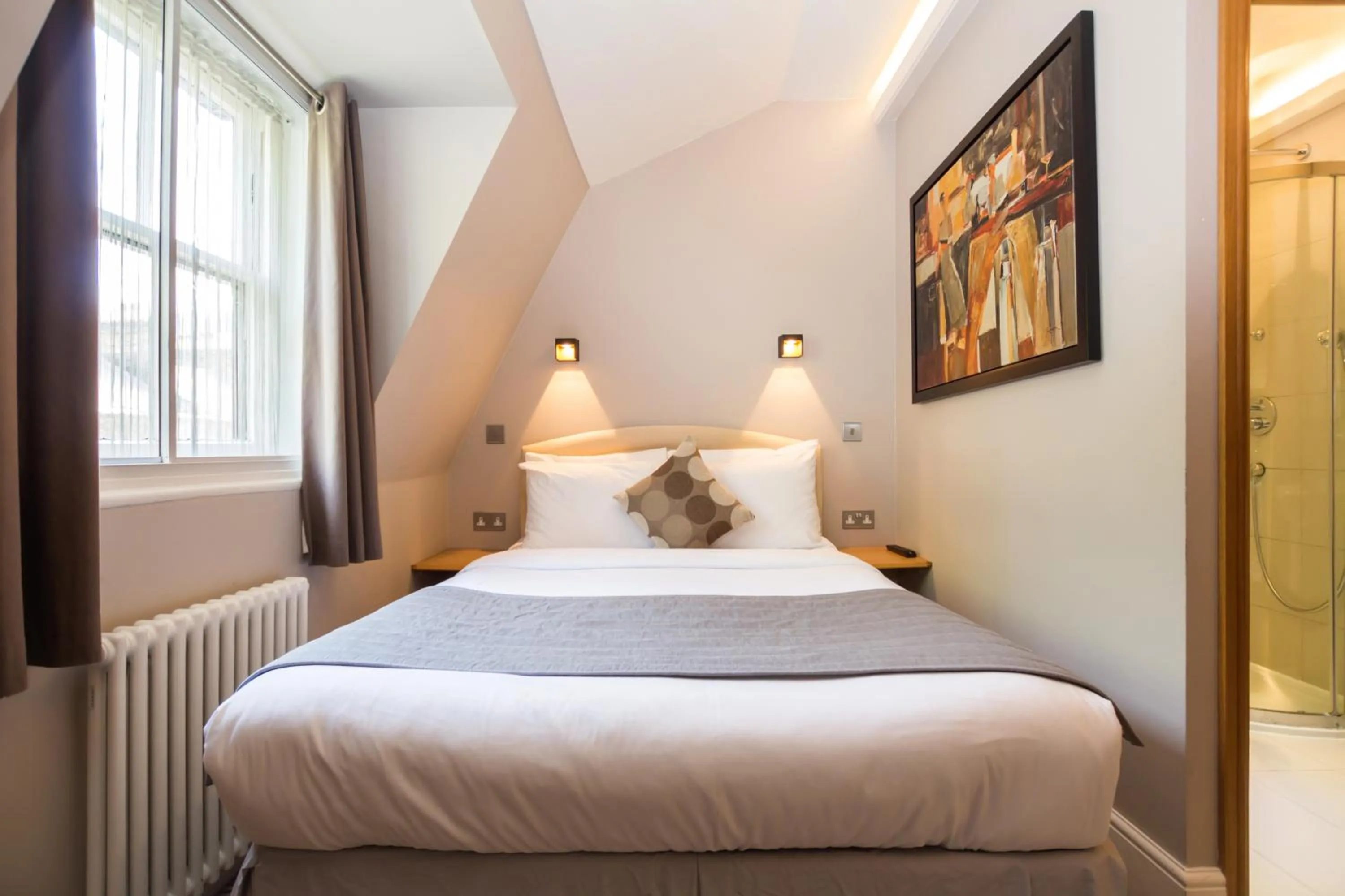 Bedroom, Bed in Arosfa Hotel London by Compass Hospitality