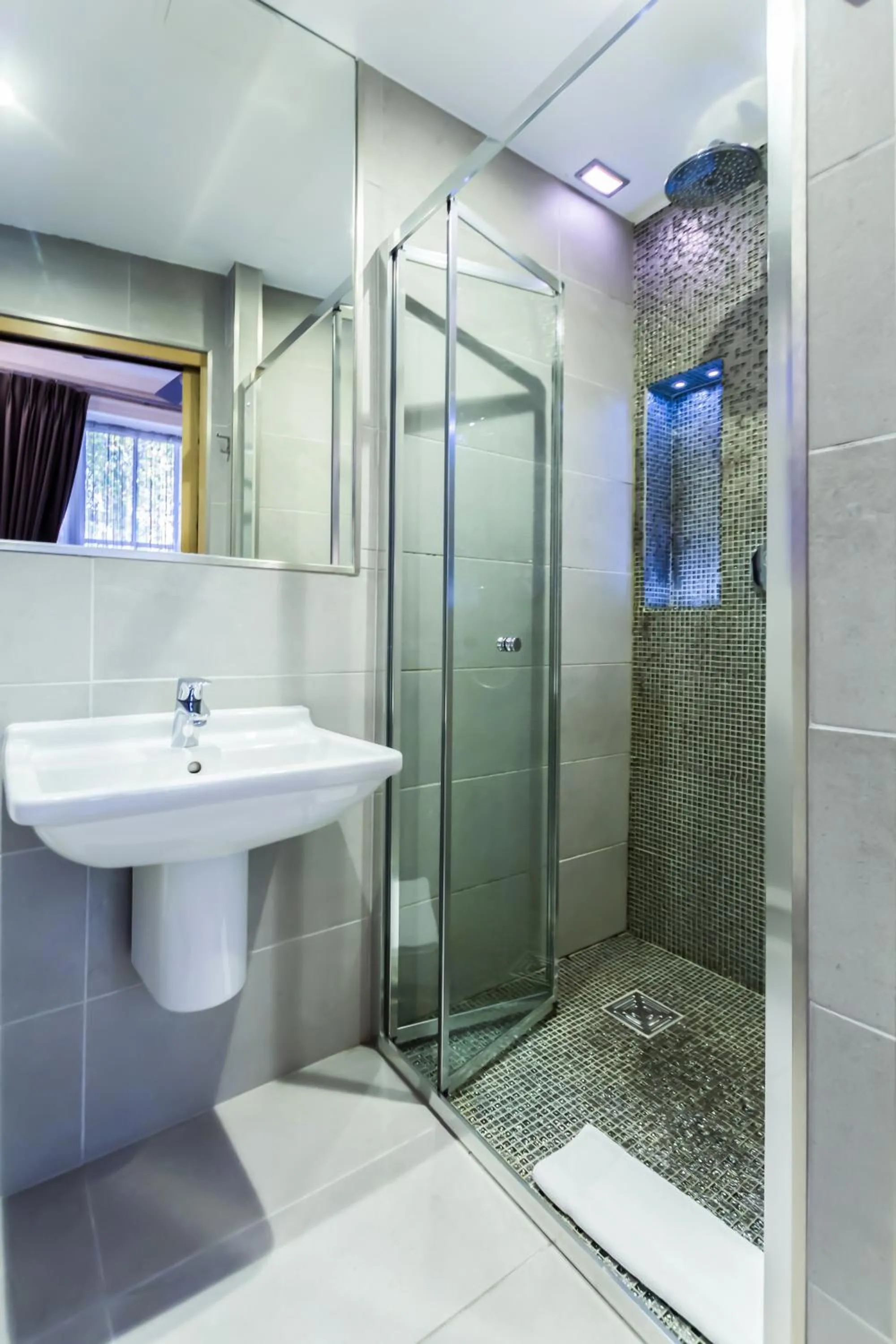 Bathroom in Arosfa Hotel London by Compass Hospitality