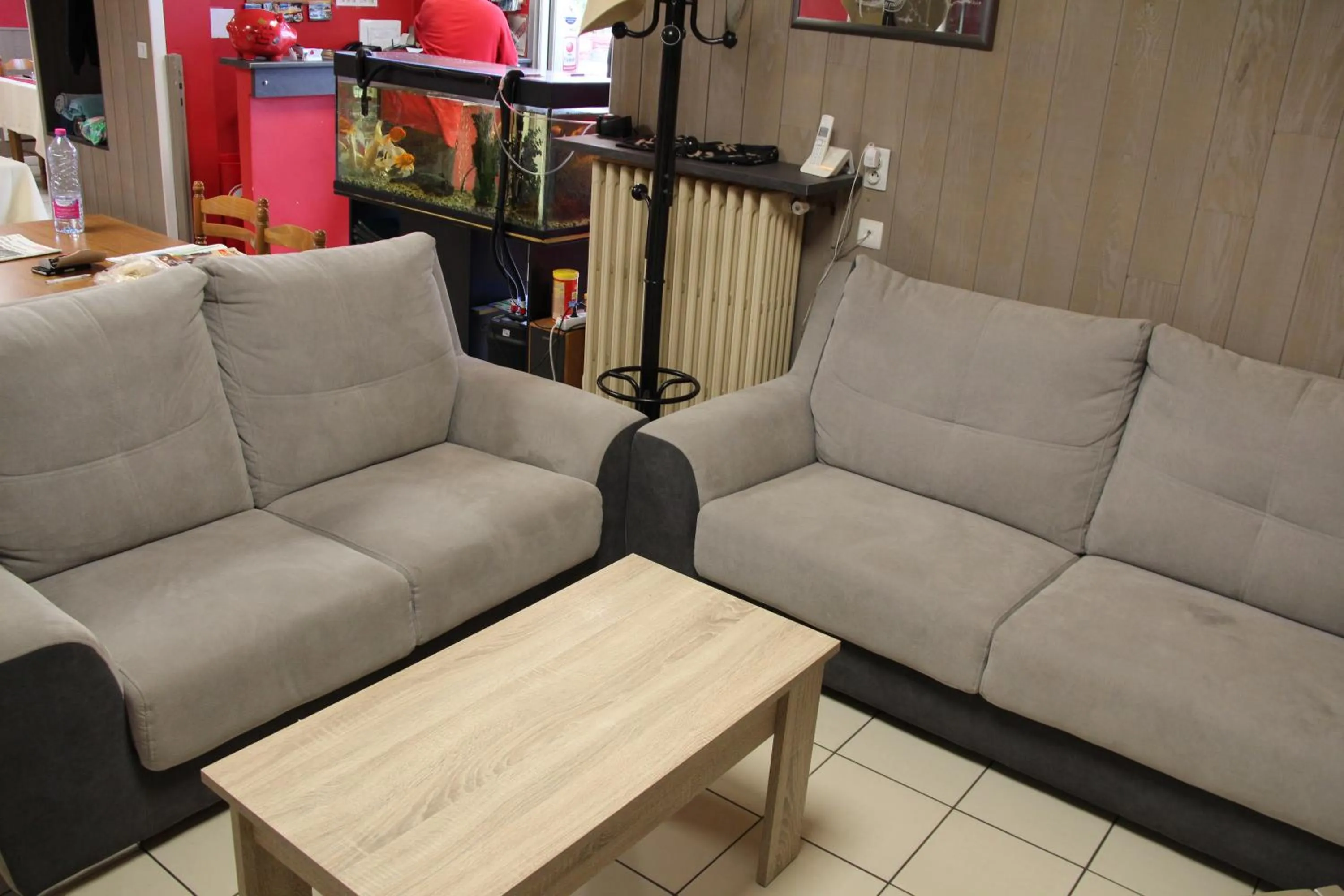 Communal lounge/ TV room in Au Petit Bonheur