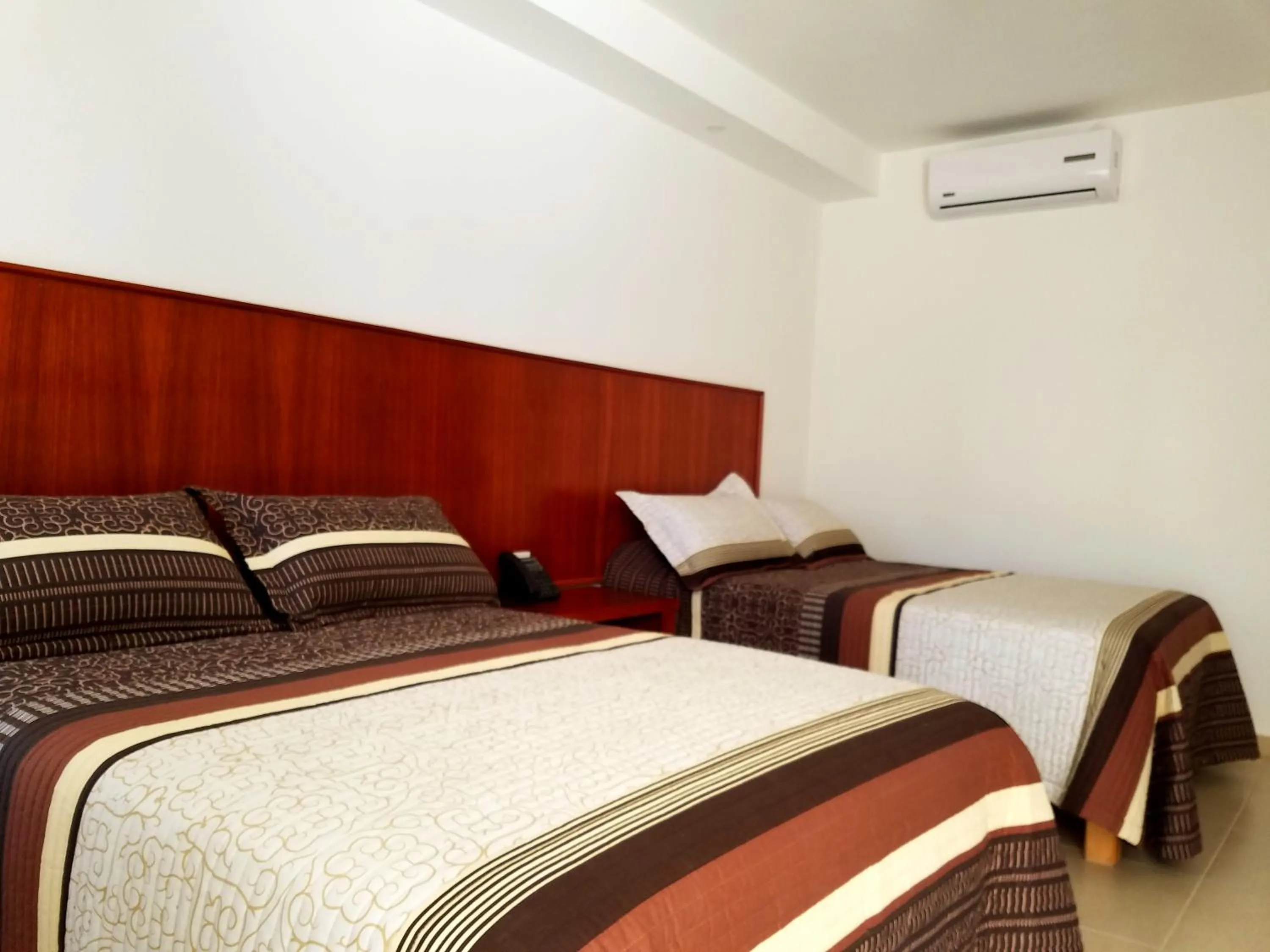 Bed in Hotel Santiago