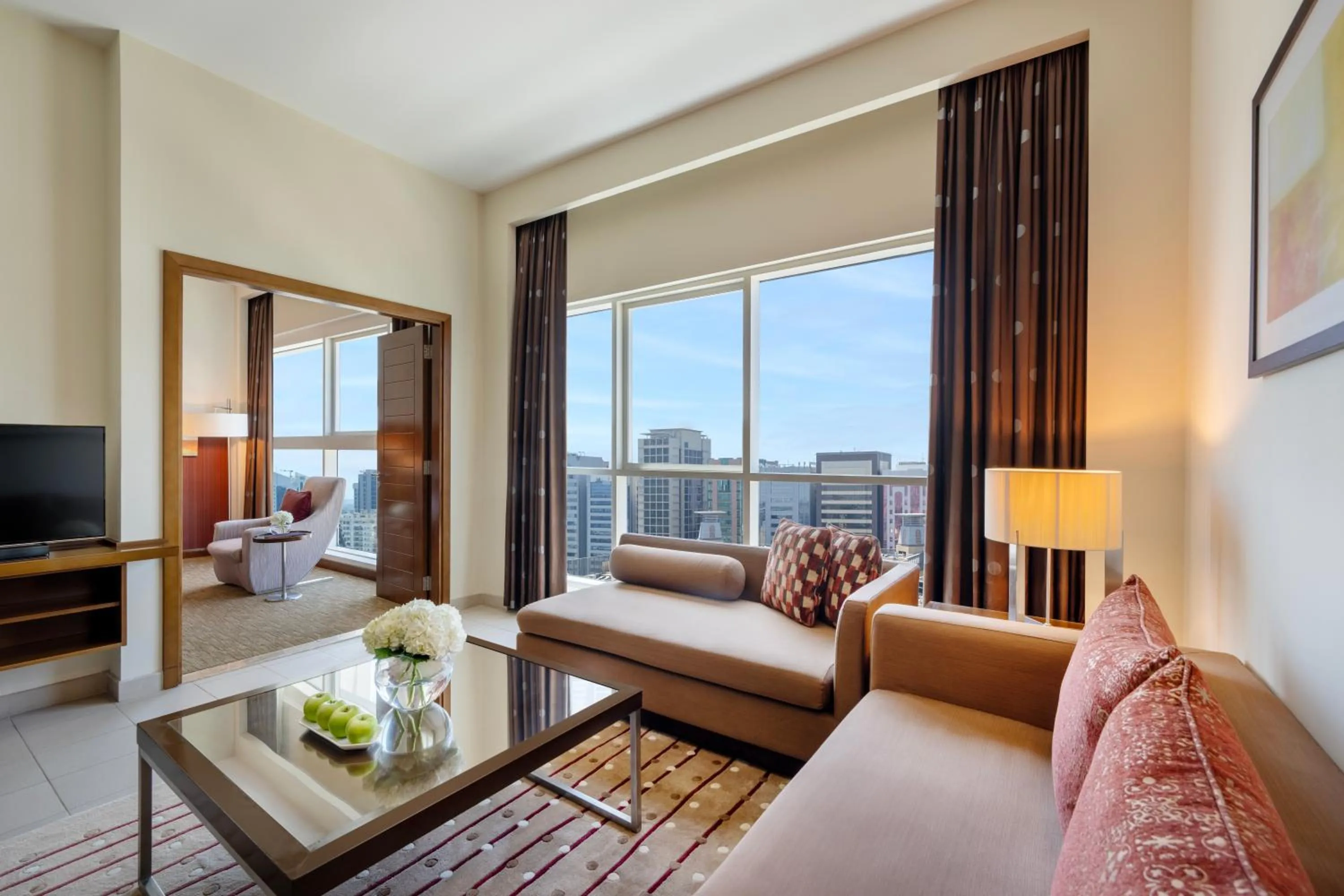 Living room in Grand Millennium Al Wahda Executive Apartments