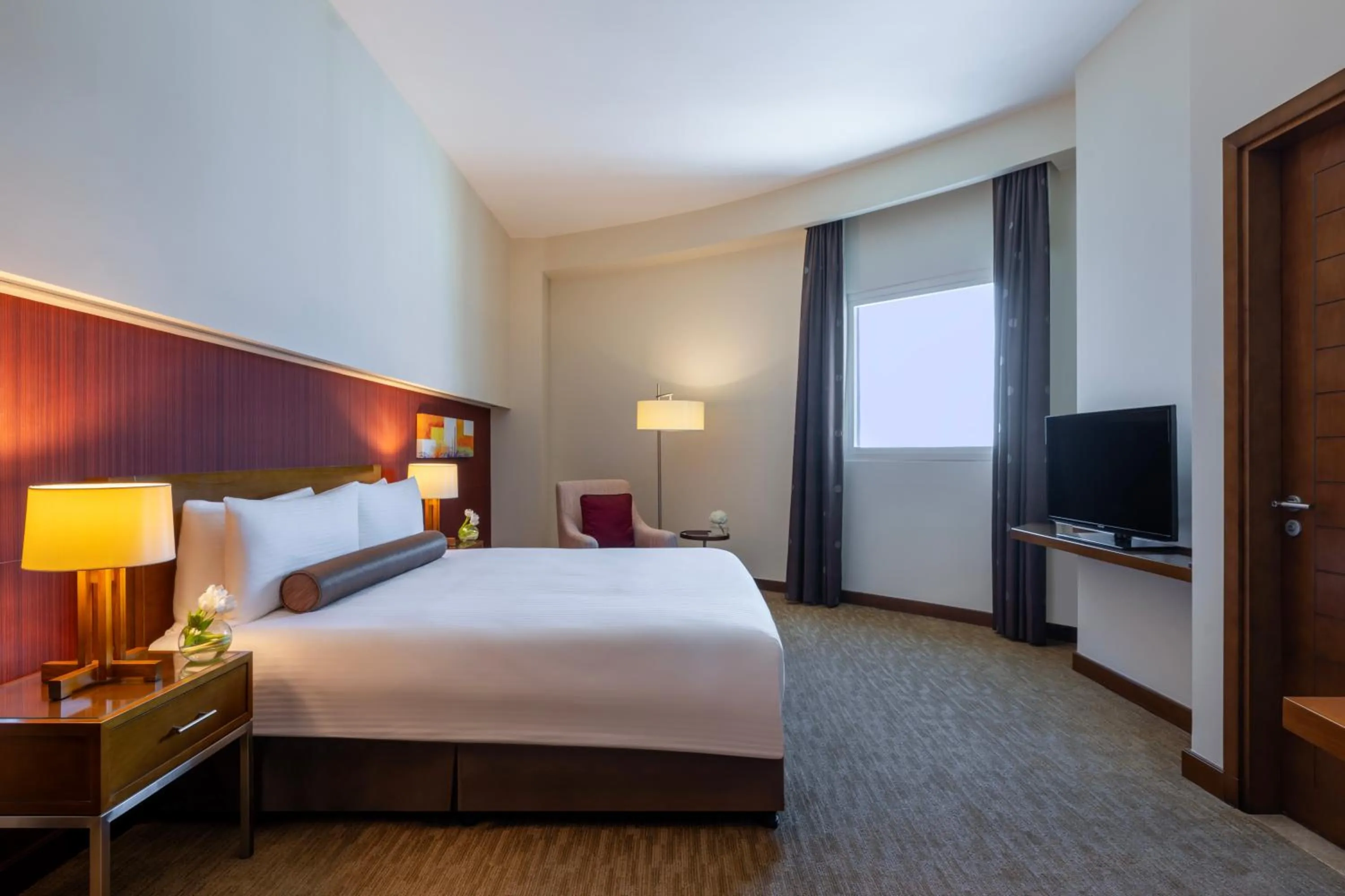 Bedroom, Bed in Grand Millennium Al Wahda Executive Apartments