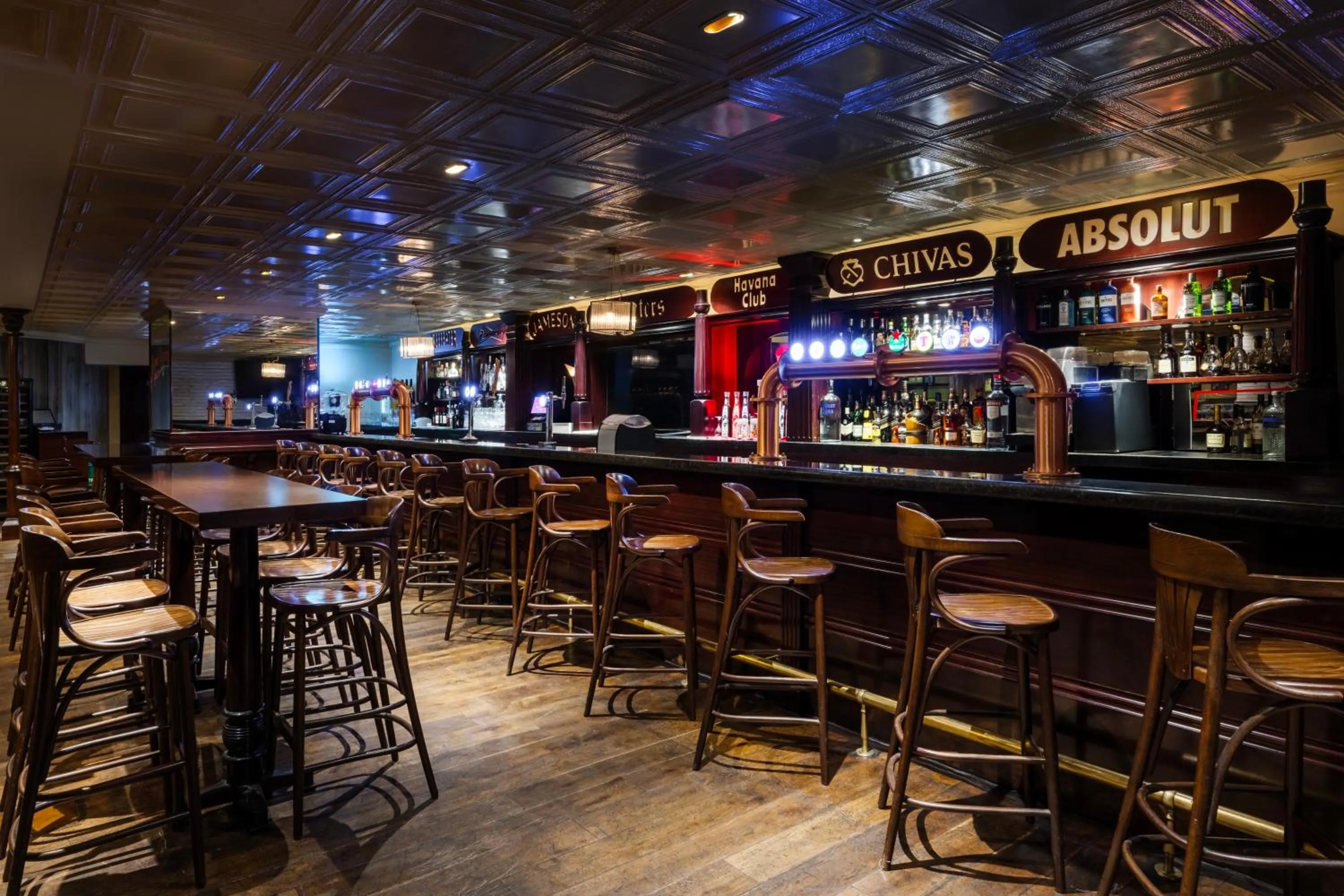 Lounge or bar in Grand Millennium Al Wahda Executive Apartments