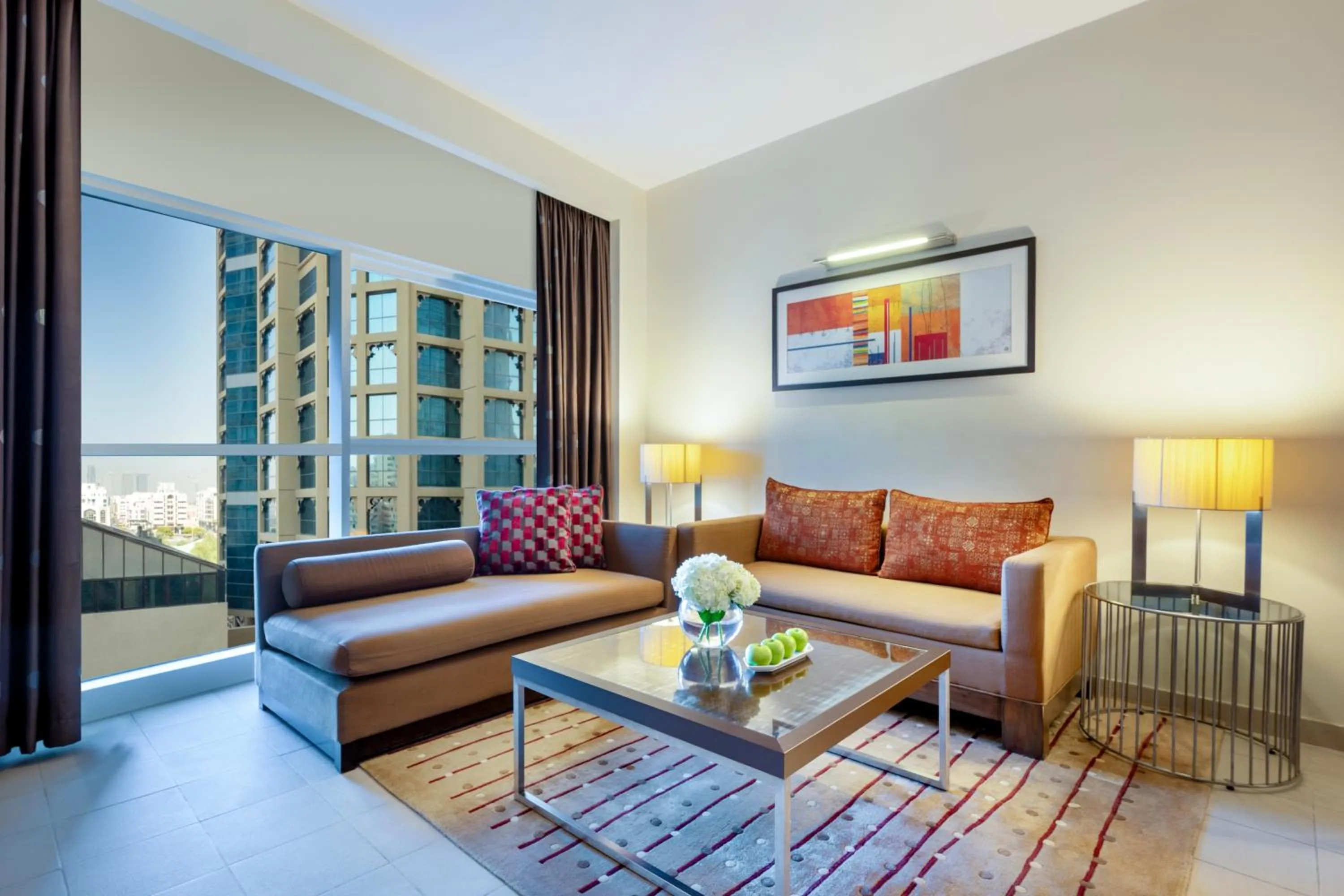 Living room in Grand Millennium Al Wahda Executive Apartments